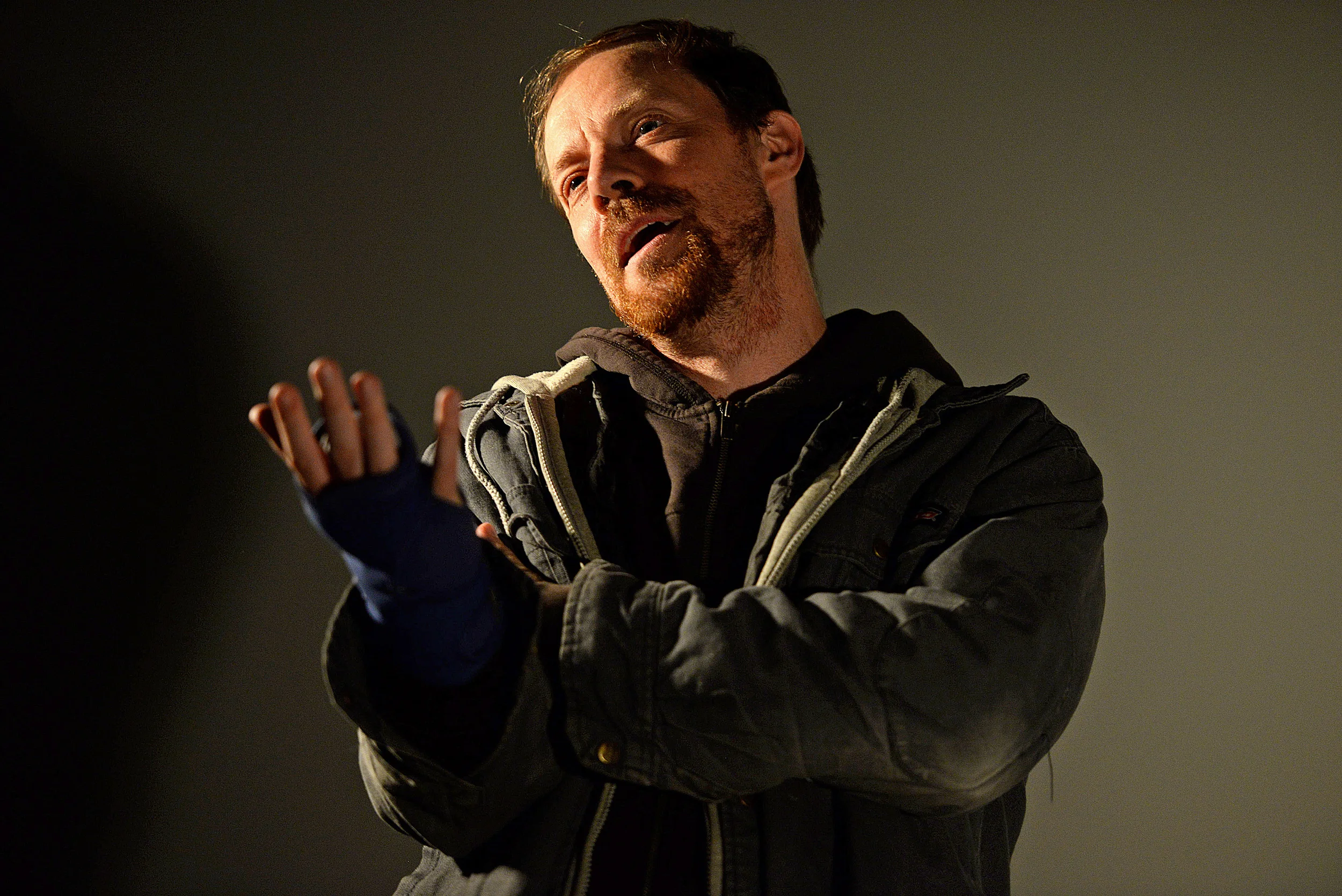Michael Milligan, of New York, acts out a scene from his one-man play "Mercy Killers" on Sept. 22 at Guyon Auditorium in Morris Library.