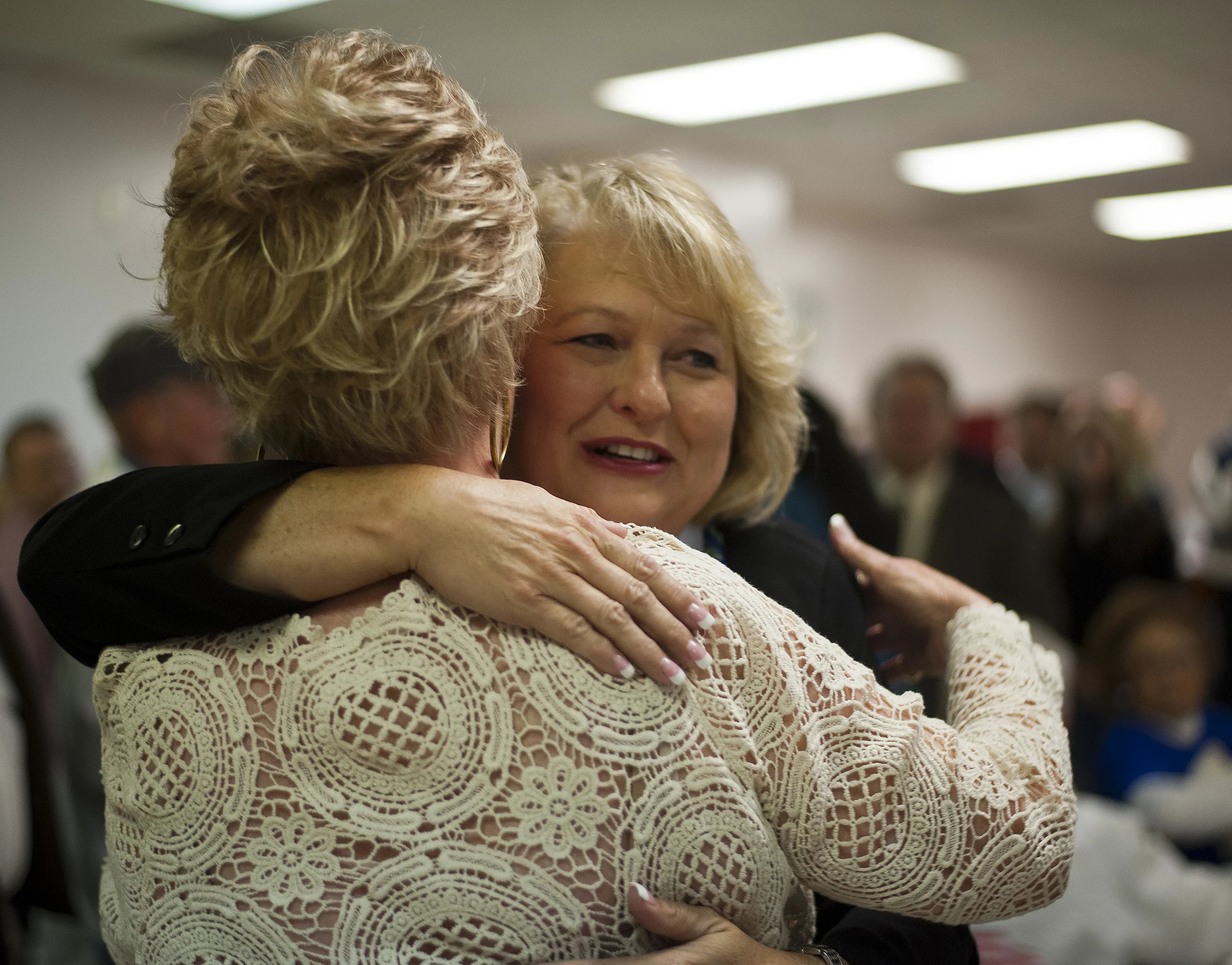 Terri Bryant (R-Murphysboro) embraces her mother, Susan Bear, of Atlanta, Ga.