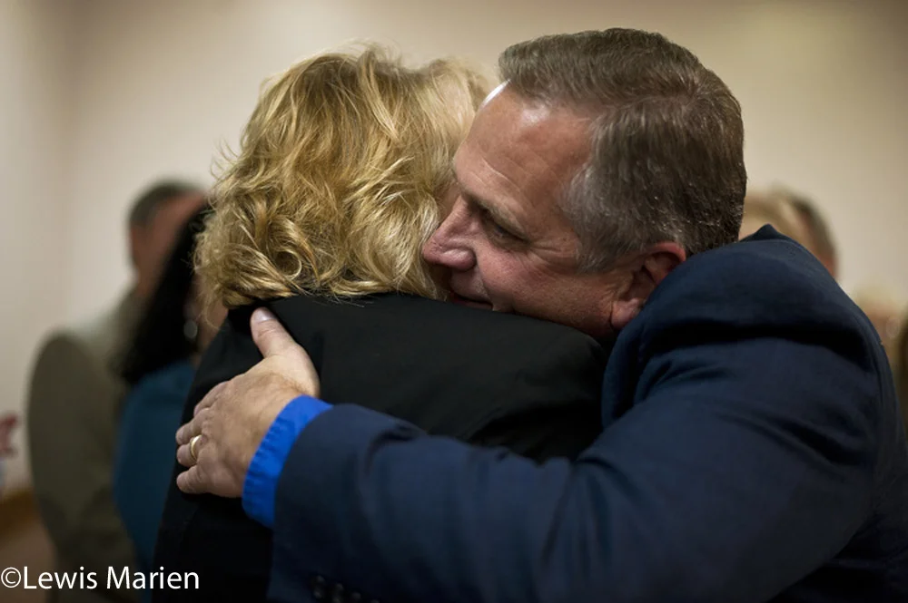 Mike Bost, R-Murphysboro, embraces Terri Bryant, R-Murphysboro, after both won their respective races on Nov. 4 (Election Day 2014) at the Elks Lodge in Murphysboro, Ill.