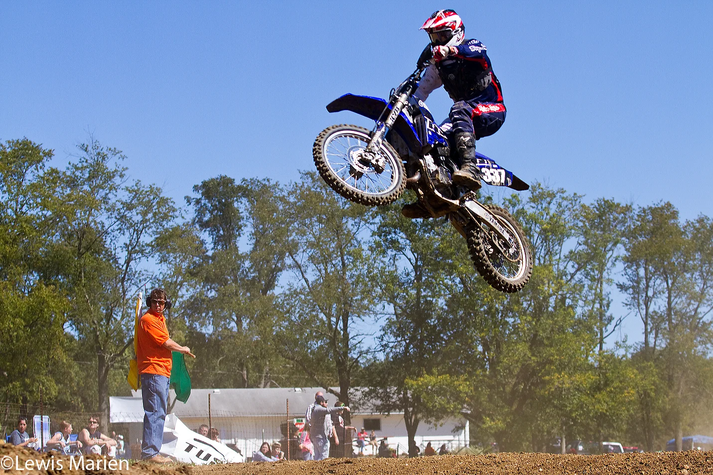 Craig Lee, of Ottawa, Ill., goes airborne during the AMA District 17 Illinois State Motocross Championship on Sept. 20 at the Galesburg Motorcycle Club near Rio, Ill.