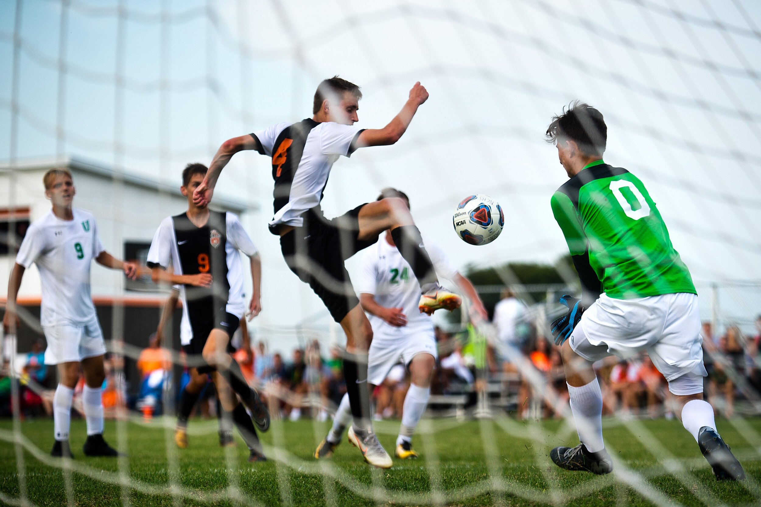  Normal Community High School forward Michael Reibling looks to score on University High School goalkeeper MacCallan Conklin during their game in the 22nd annual Intercity Boys Soccer Tournament on Thursday, Aug. 30, 2018, in Normal, Illinois. Reibli
