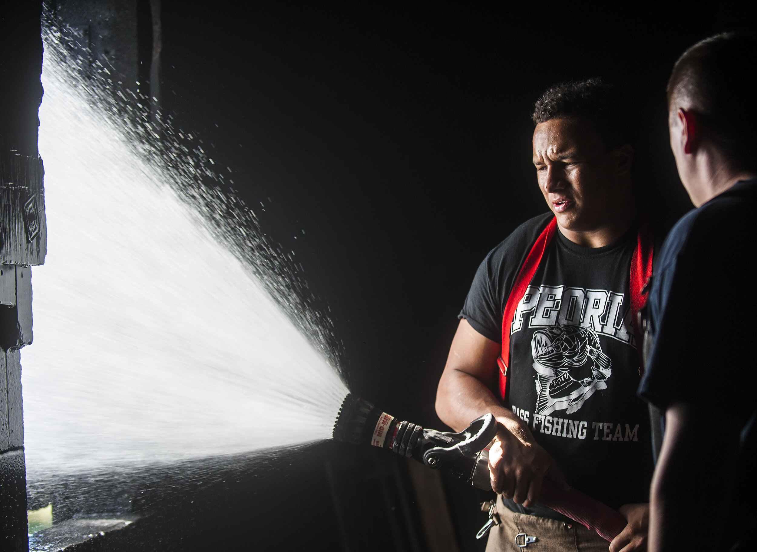  Peoria High School student Kendrick Green uses a fire hose during hands-on training Sunday, Oct. 9, 2016, at the Peoria Fire Training Academy, 7130 N. Galena Road. 