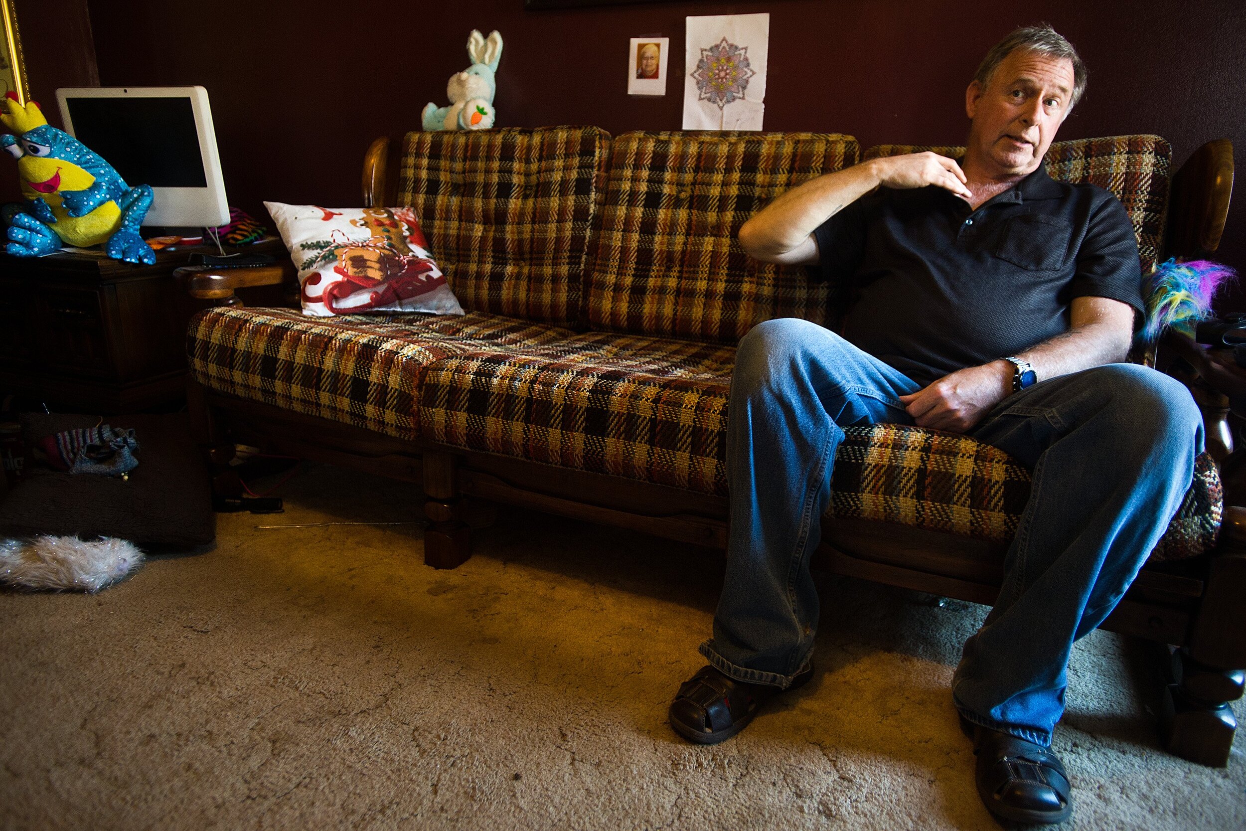  Dennis Fett sits on a couch and talks Tuesday, April 9, 2019, about the deep brain stimulation surgery he went under to control his Parkinson's disease symptoms. "It's like being given a second chance," Fett reflected. "I know I'm not healed. But it