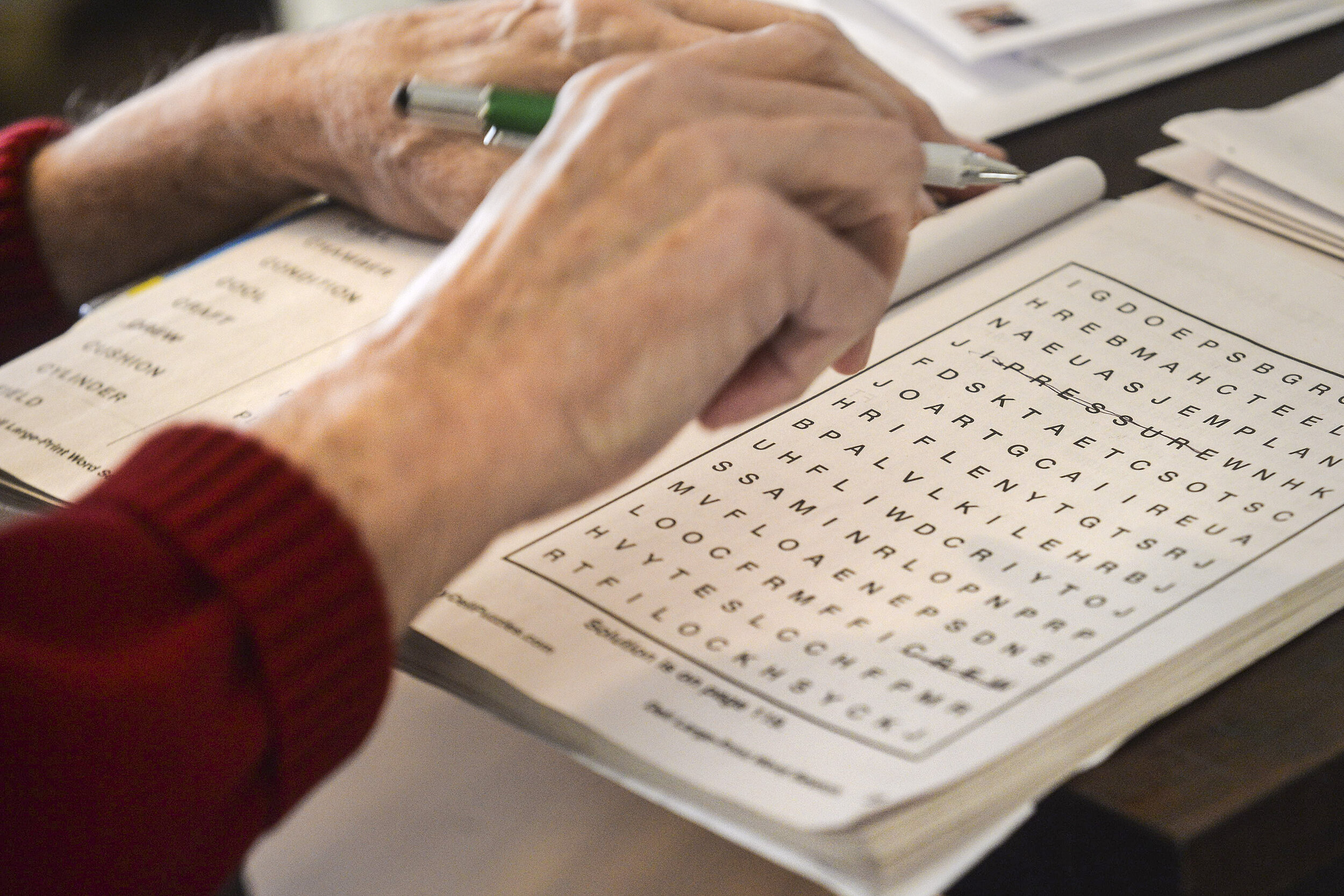  Rich Buchanan found the word “PRESSURE” while working a word search Friday, Feb. 2, 2018, at his home in Bloomington, Illinois. 
