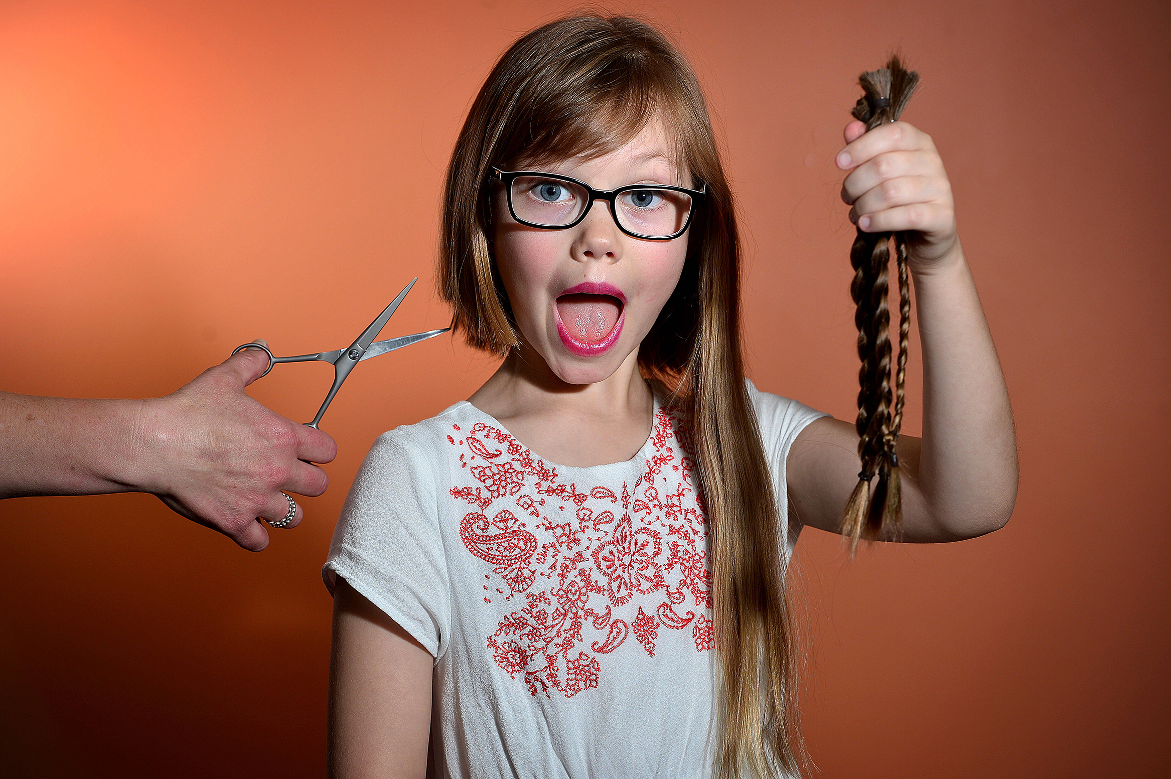  4.3.17 - 8 year old Matilda Ebert is cutting most of her hair off as part of World's Greatest Shave, and donating it to Wigs for Kids. (The Advertiser, News Corp Australia) 