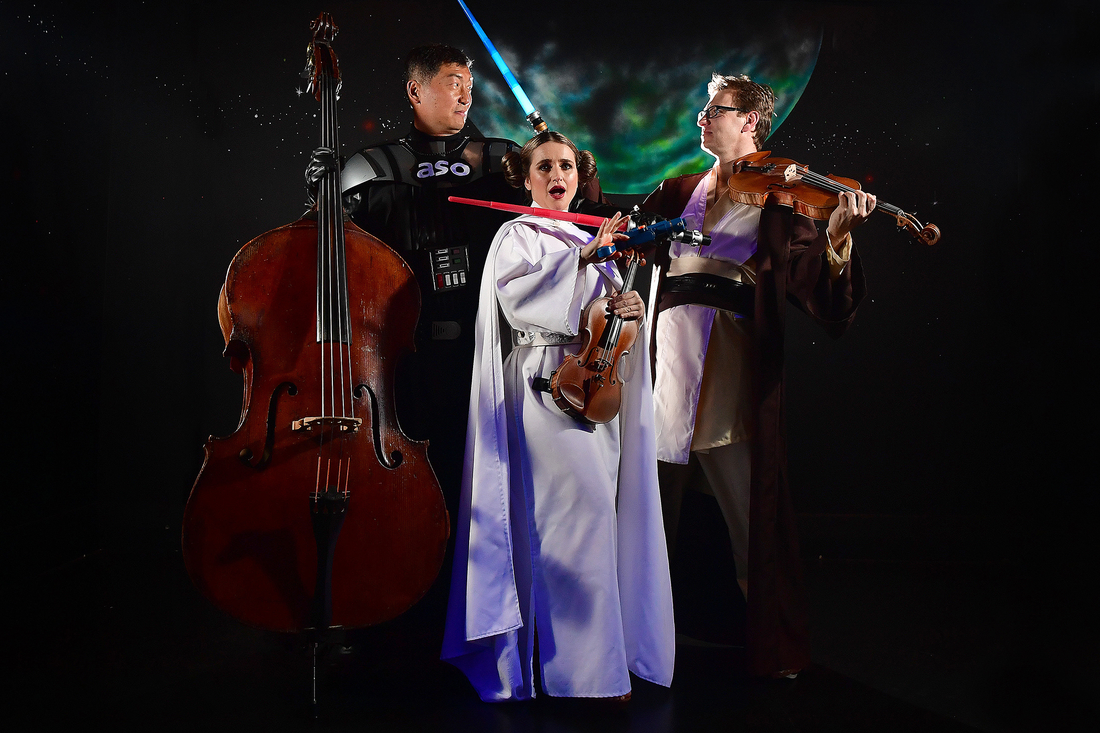  11.8.17 - Adelaide Symphony Orchestra members Michael Robertson (viola - Han Solo),  Emma Perkins (violin-Princess Leia) and Jacky Chang (double bass - Darth Vadar) get into the Star Wars spirit ahead of the ASO's ' program launch &amp; full program