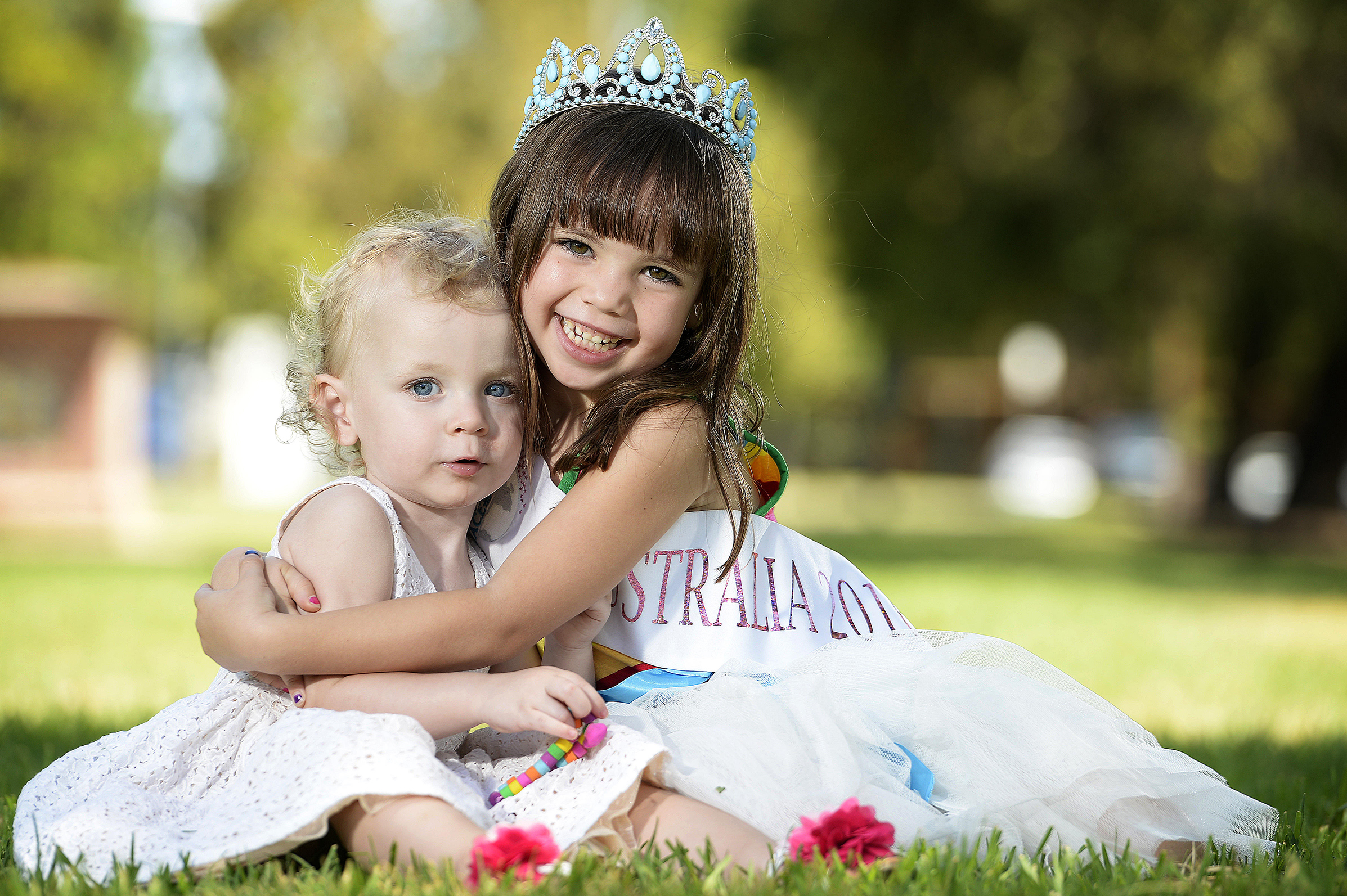  5.1.16 - HeartKids SA child Jacinta Molloy (21mths) with ' Face of the Globe' contestant Eva-Joy Hinde (4yrs), who is raising money for HeartKids SA. (Sunday Mail, News Corp Australia) 