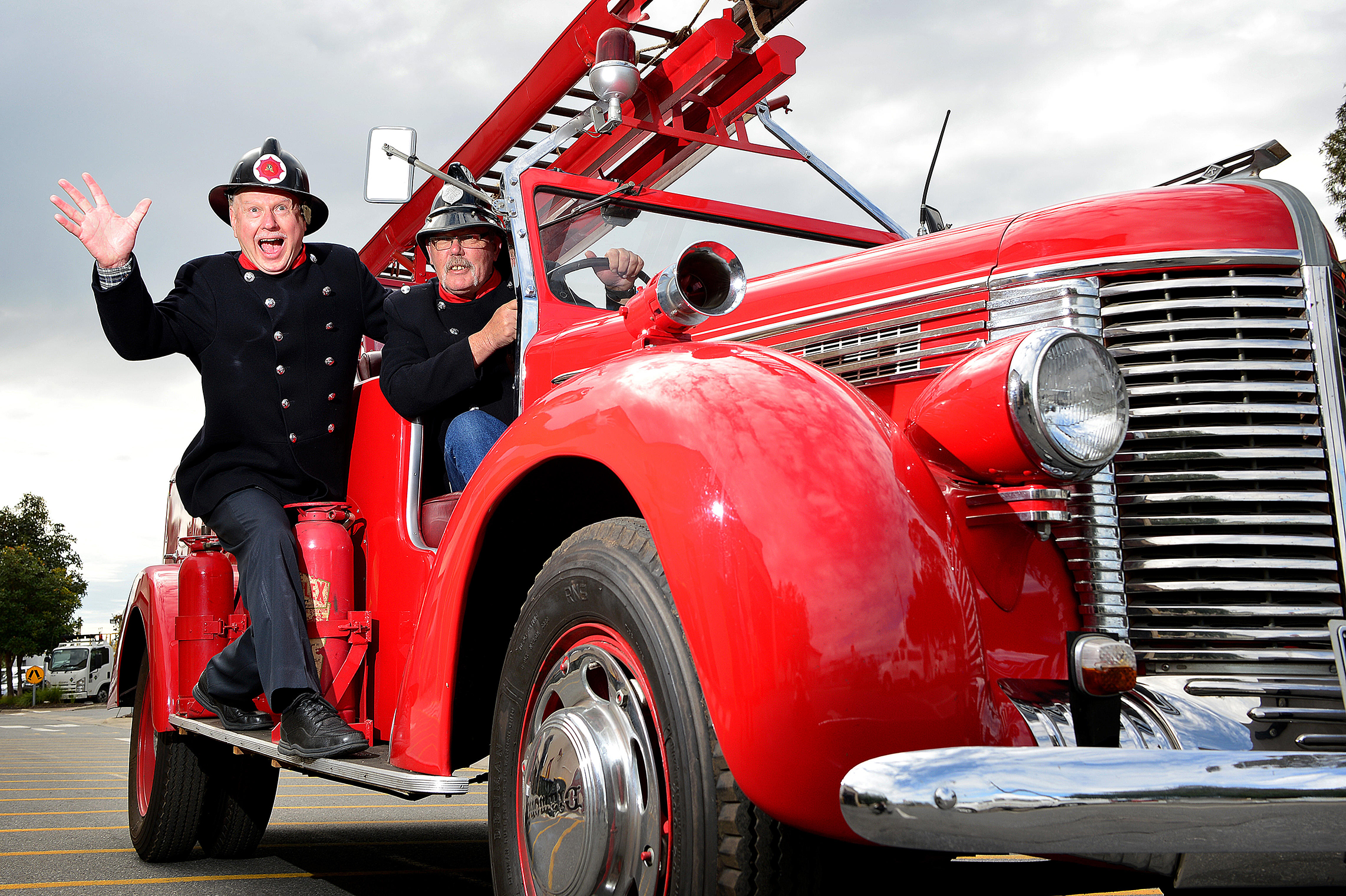 CHP_Export_143568786_Tony Williams and Ron Raines truck driver with a 1938 Diamond T Fire Engine at.jpg