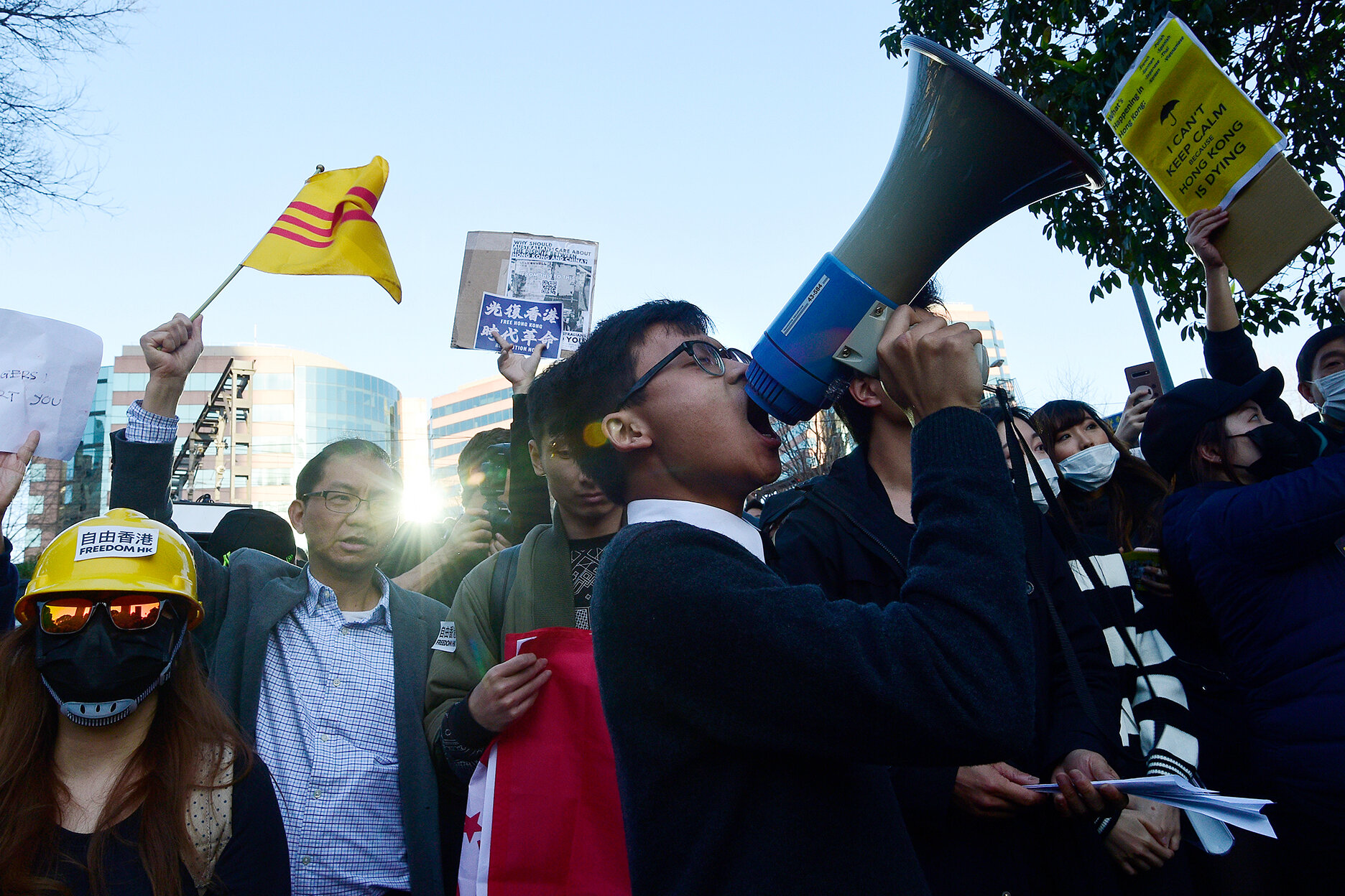  Pro-democracy Hong Kong supporters gather at a demonstration in Sydney, Sunday, August 18, 2019. (AAP Image) 