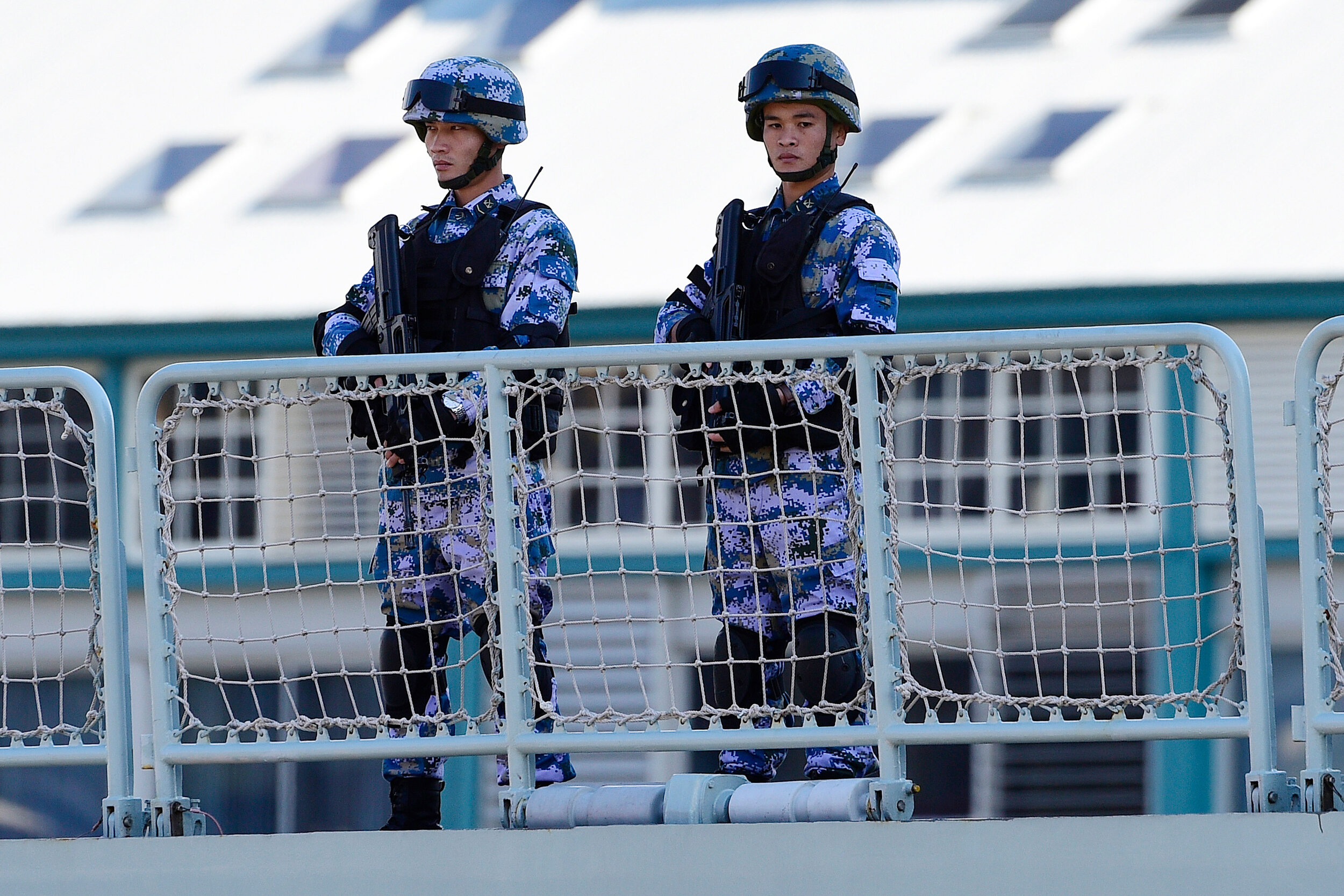  Chinese Navy personnel are seen onboard a Chinese Navel ship after it arrives at Garden Island Naval Base in Sydney, Monday, June 3, 2019. Australian Prime Minister Scott Morrison said it was a reciprocal visit after Australian naval vessels visited