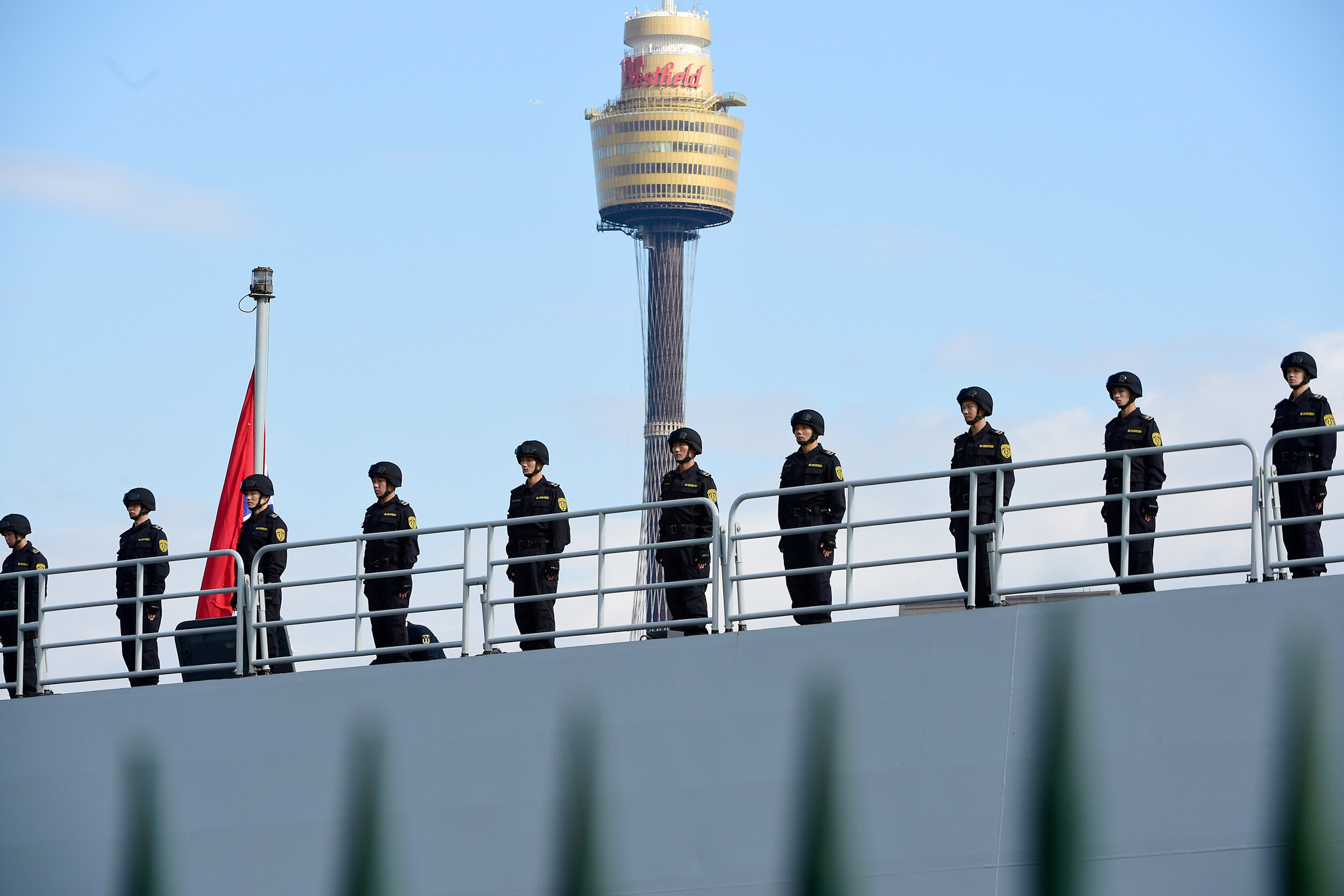  Chinese Navy personnel are seen onboard a Chinese Navel ship after it arrives at Garden Island Naval Base in Sydney, Monday, June 3, 2019. Australian Prime Minister Scott Morrison said it was a reciprocal visit after Australian naval vessels visited