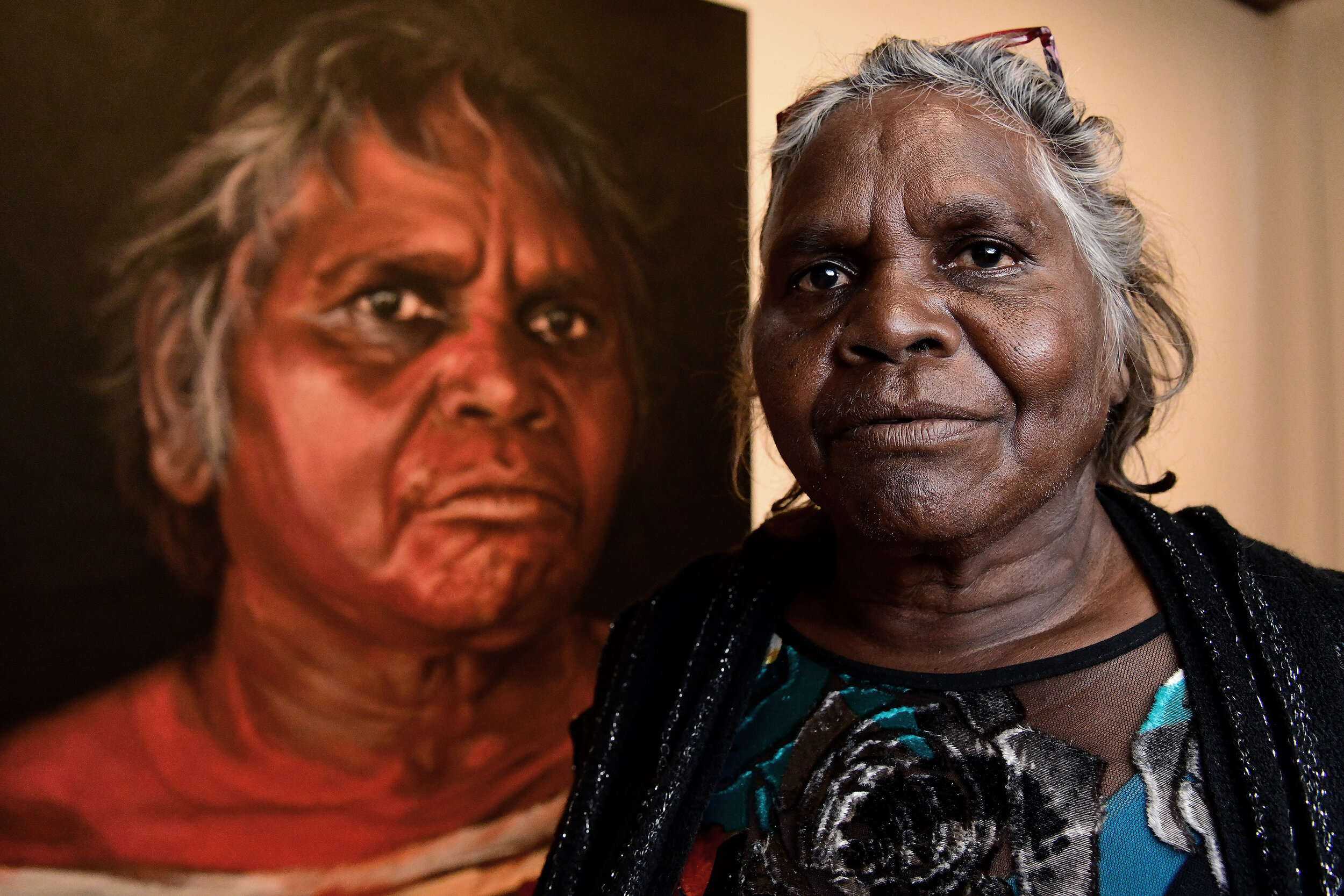  Aboriginal Elder Daisy Tjuparntarri Ward poses for a photograph in front of artist David Darcy's portrait of her at the Art Gallery of NSW, Sydney, Wednesday, August 14, 2019. David Darcy's portrait of Daisy, 'Tjuparntarri - Women's Business', has w
