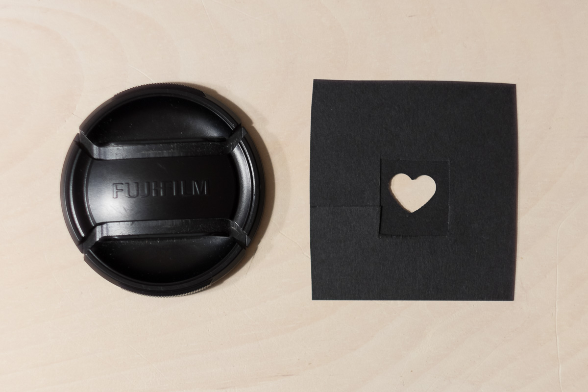 Cut a shape in black cardboard