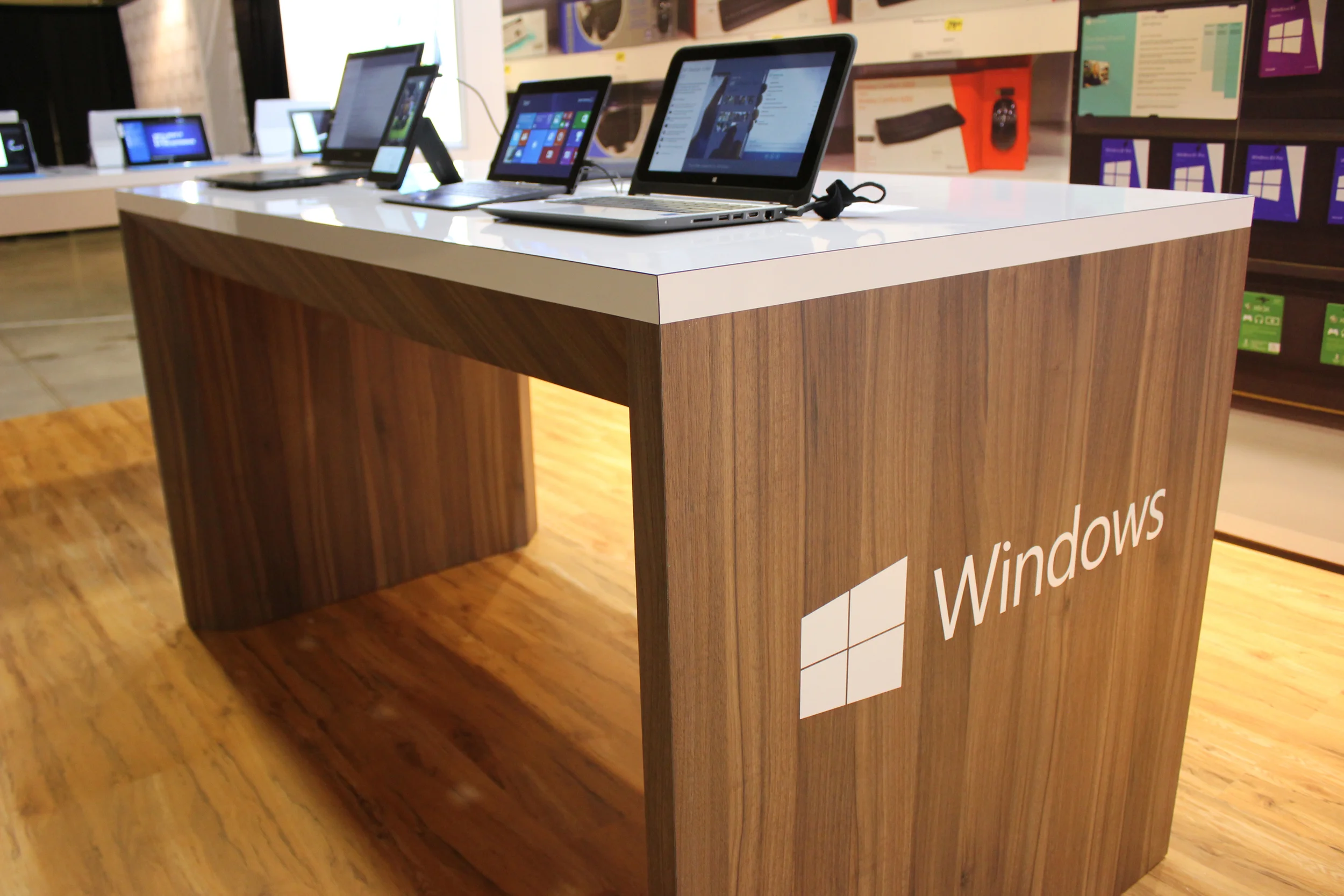 For this Windows 8 booth we incorporated wood flooring, custom millwork to craft the device bars, backlit graphics and an interactive back wall