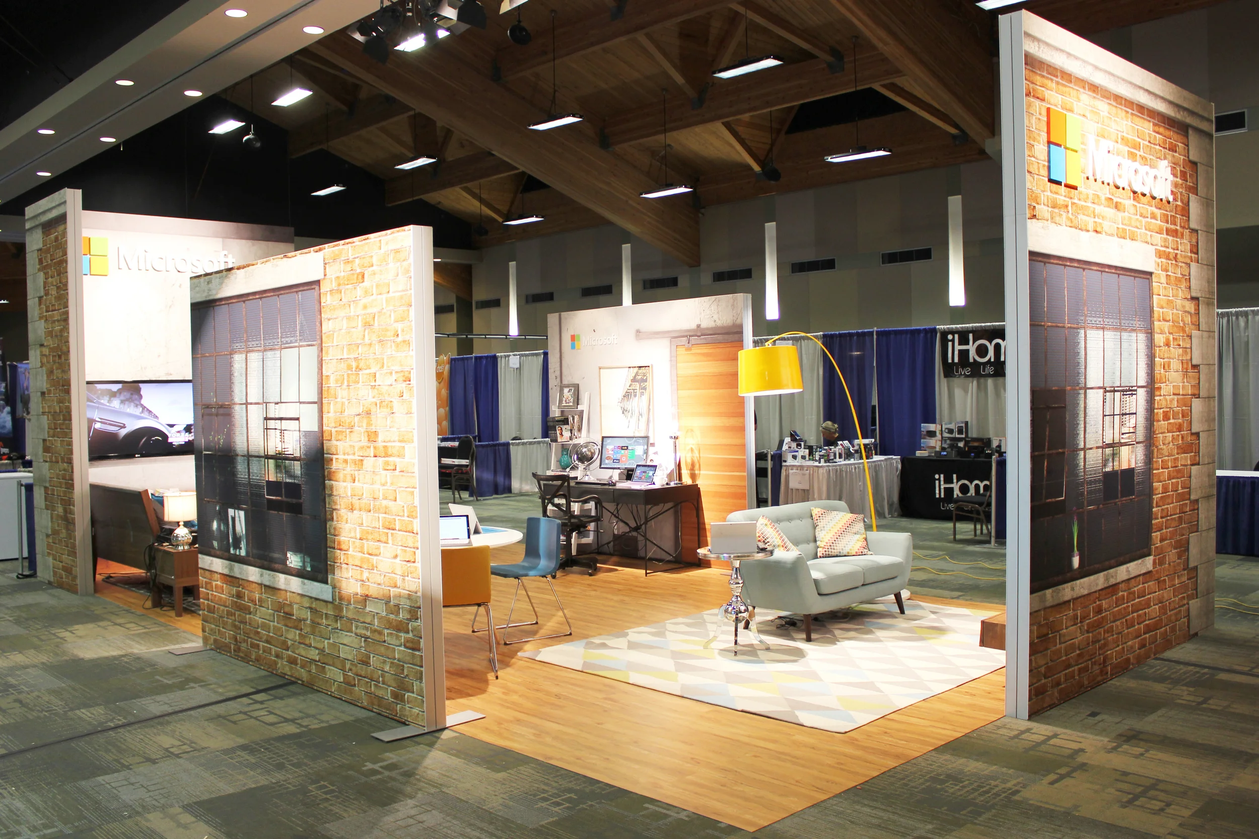 Designed to simiulate an in-home Microsoft experience at a trendy loft this trade show booth rental is always a hit