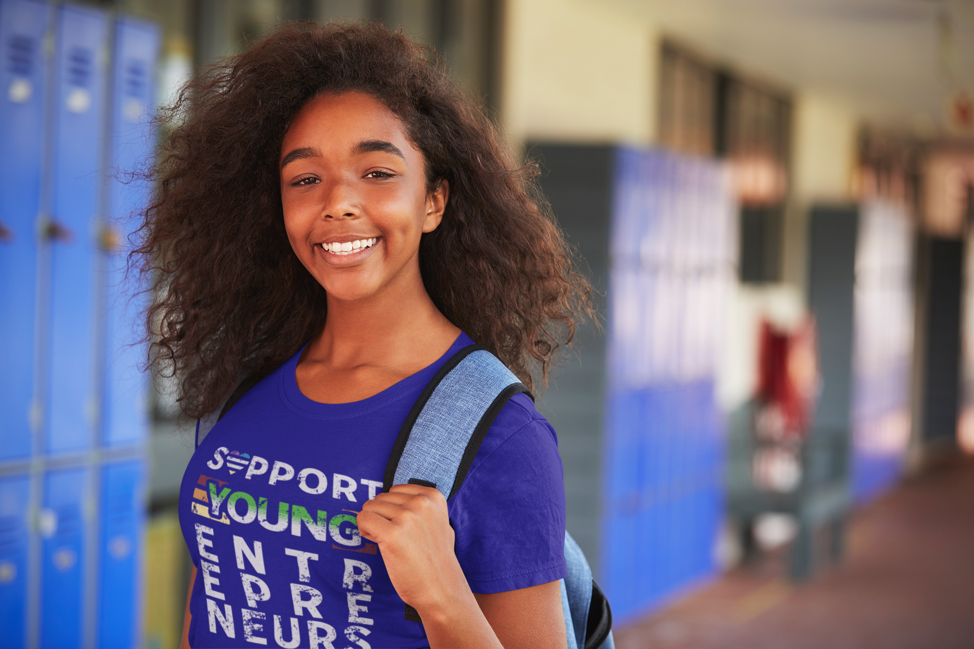 t-shirt-mockup-of-a-curly-haired-teen-at-school-34242-r-el2 (1).png