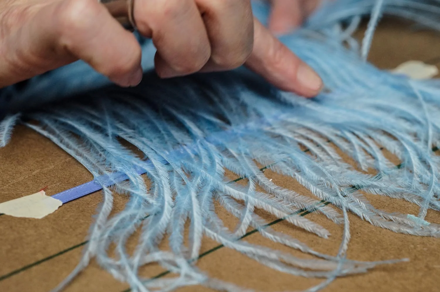 Hot_Gluing_Feathers.jpg
