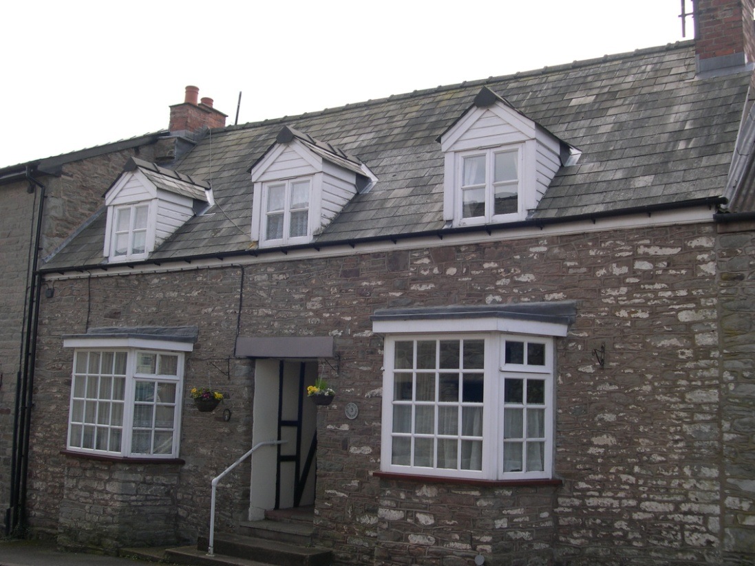 Number 3 Bear Street is to the right of the entrance
