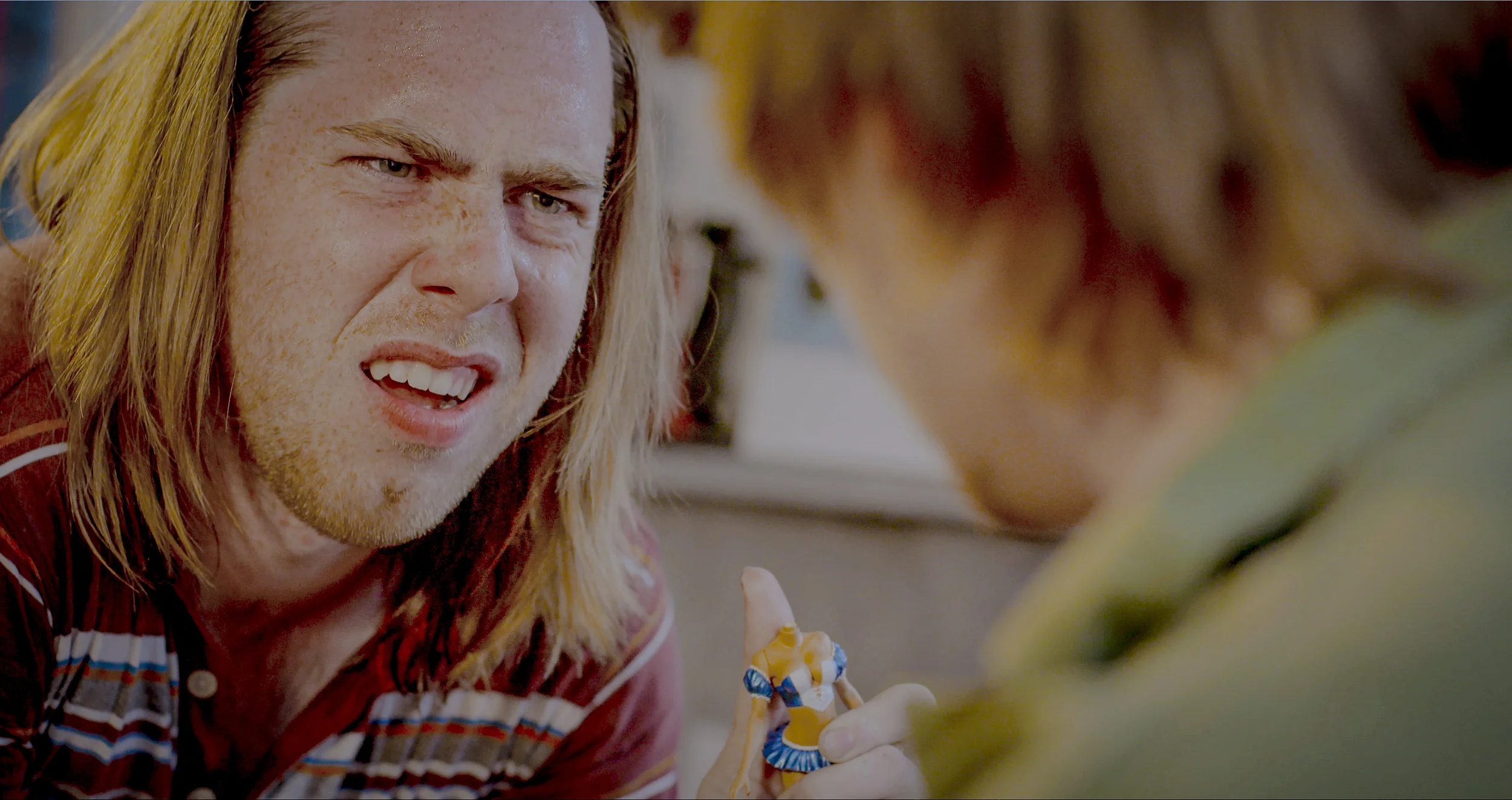 Don't mess with Ricky. Russell plays both Good Cop/Bad Cop with Sean Newman as sinister pothead, "Michael".