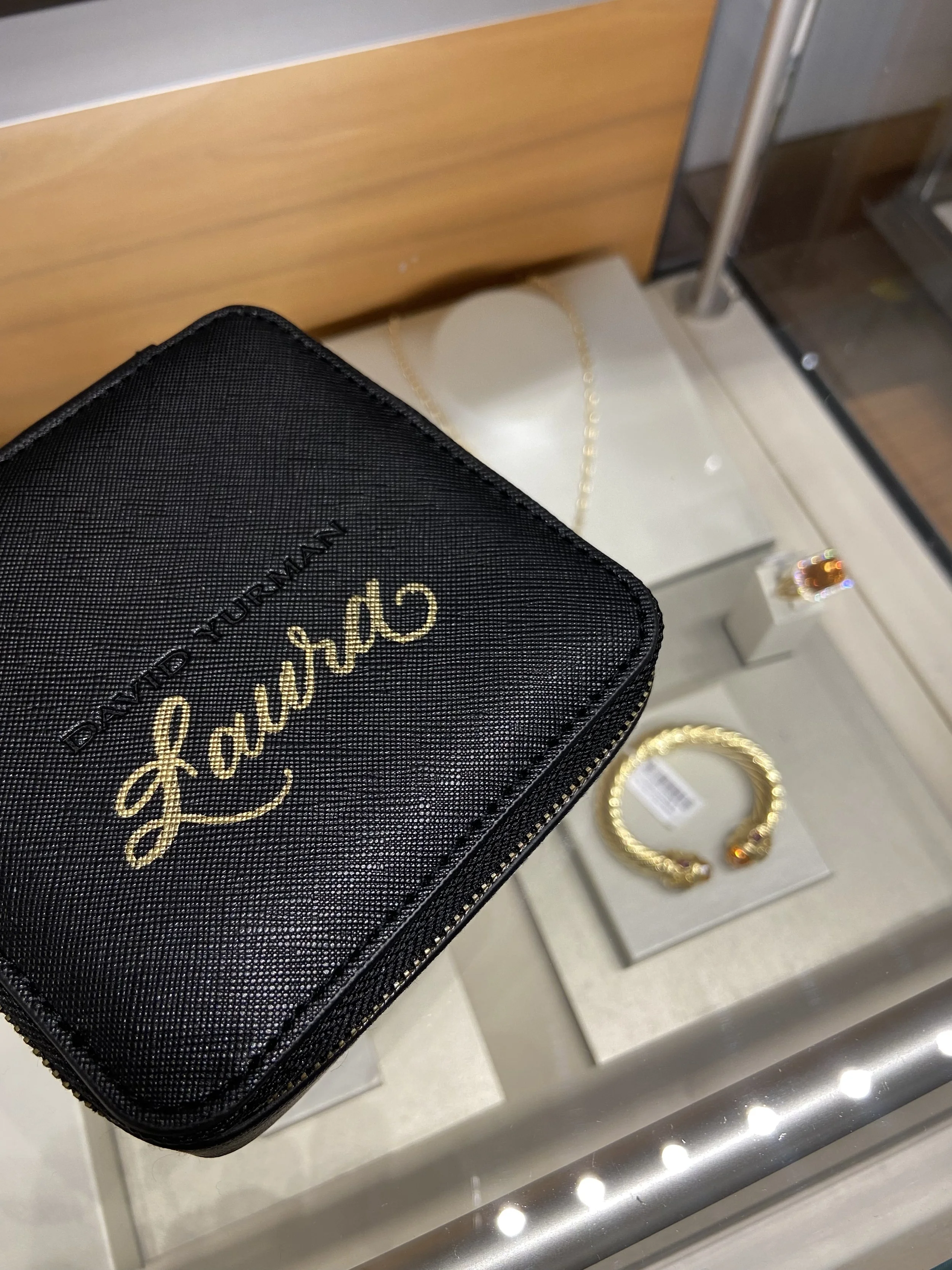 Leather case with gold calligraphy from live calligraphy event