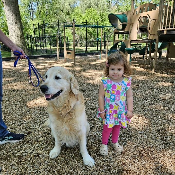 Hanging out with her buddy Finn at the park.