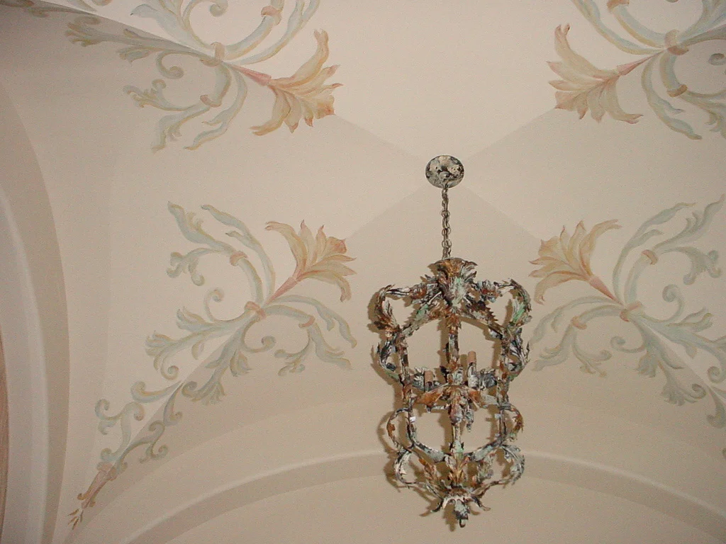 Painted patterns on groin vaulted ceiling