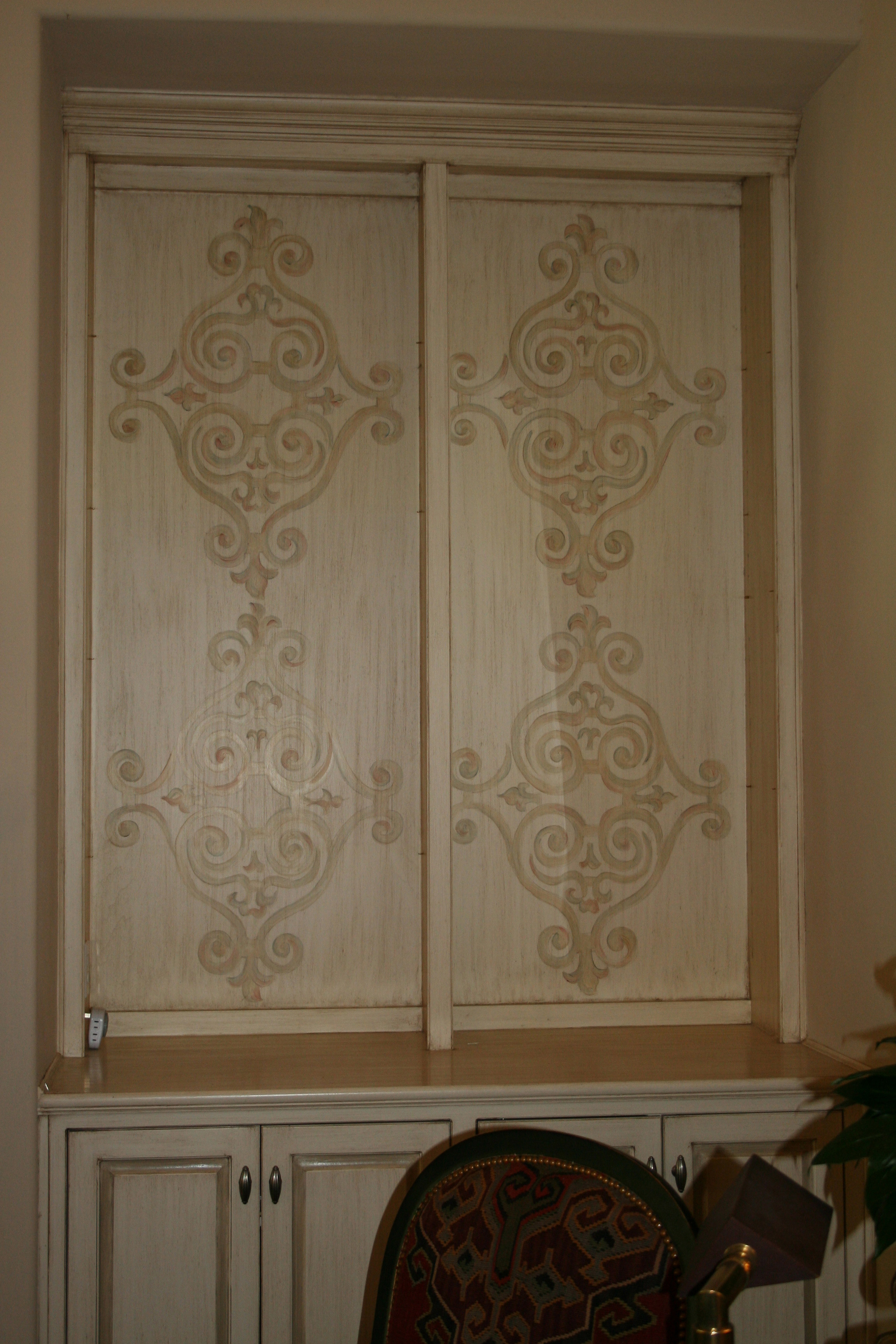  Custom hand painted patterns on cabinet doors 