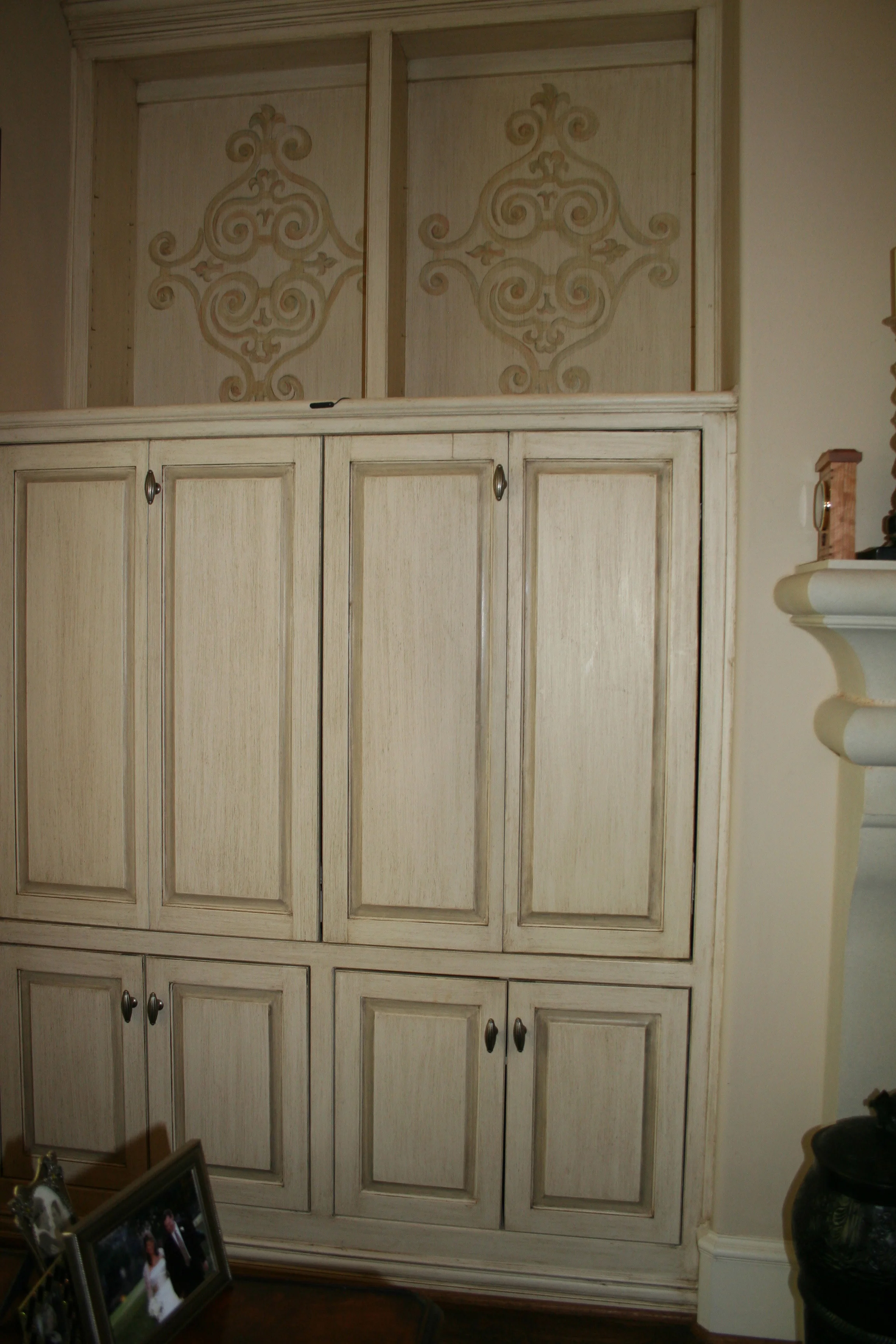 Custom hand painted patterns on cabinet doors