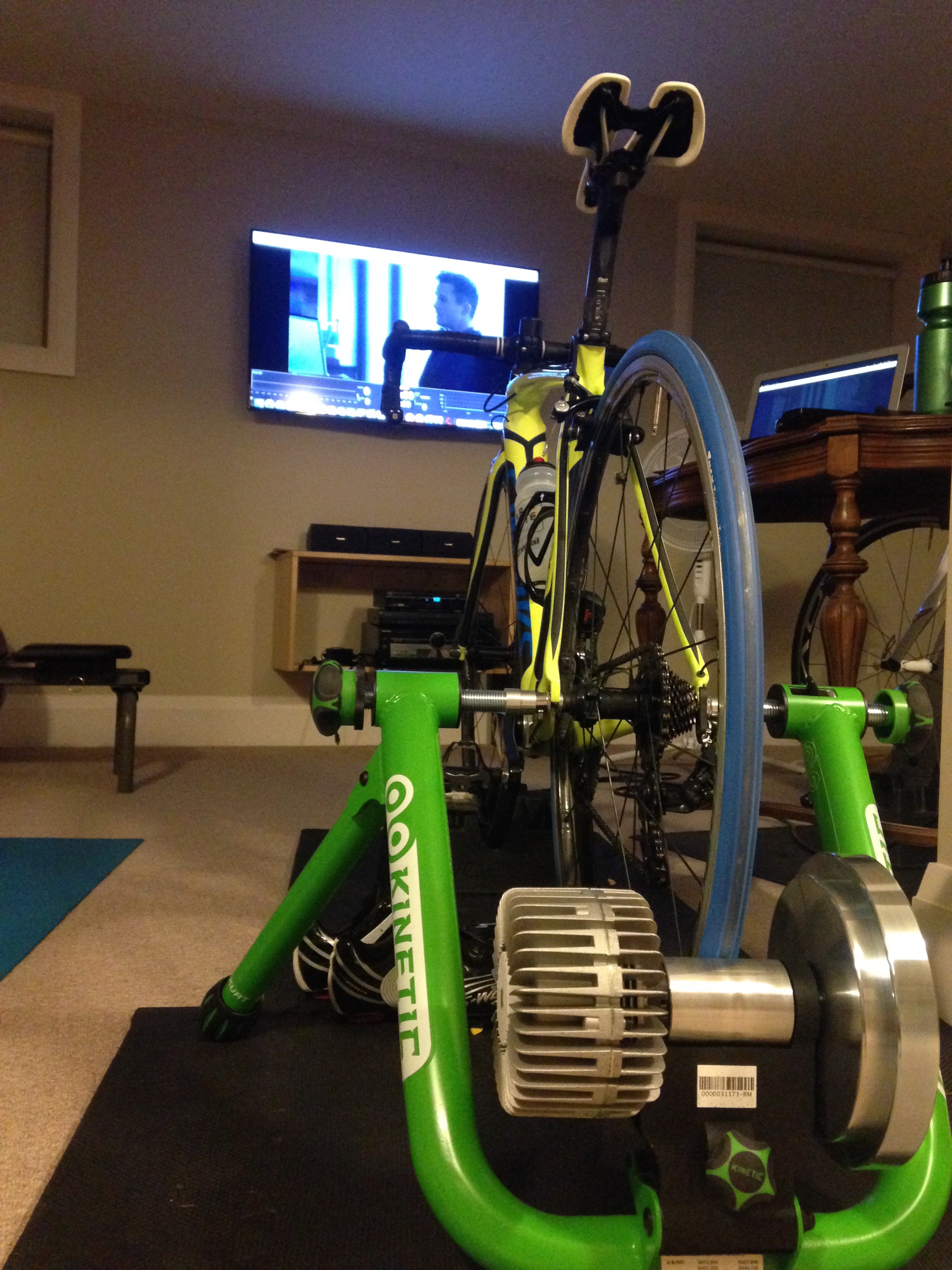 Kurt Kinetic Road Machine & Trainer Road software playing over top of Netflix on TV. 