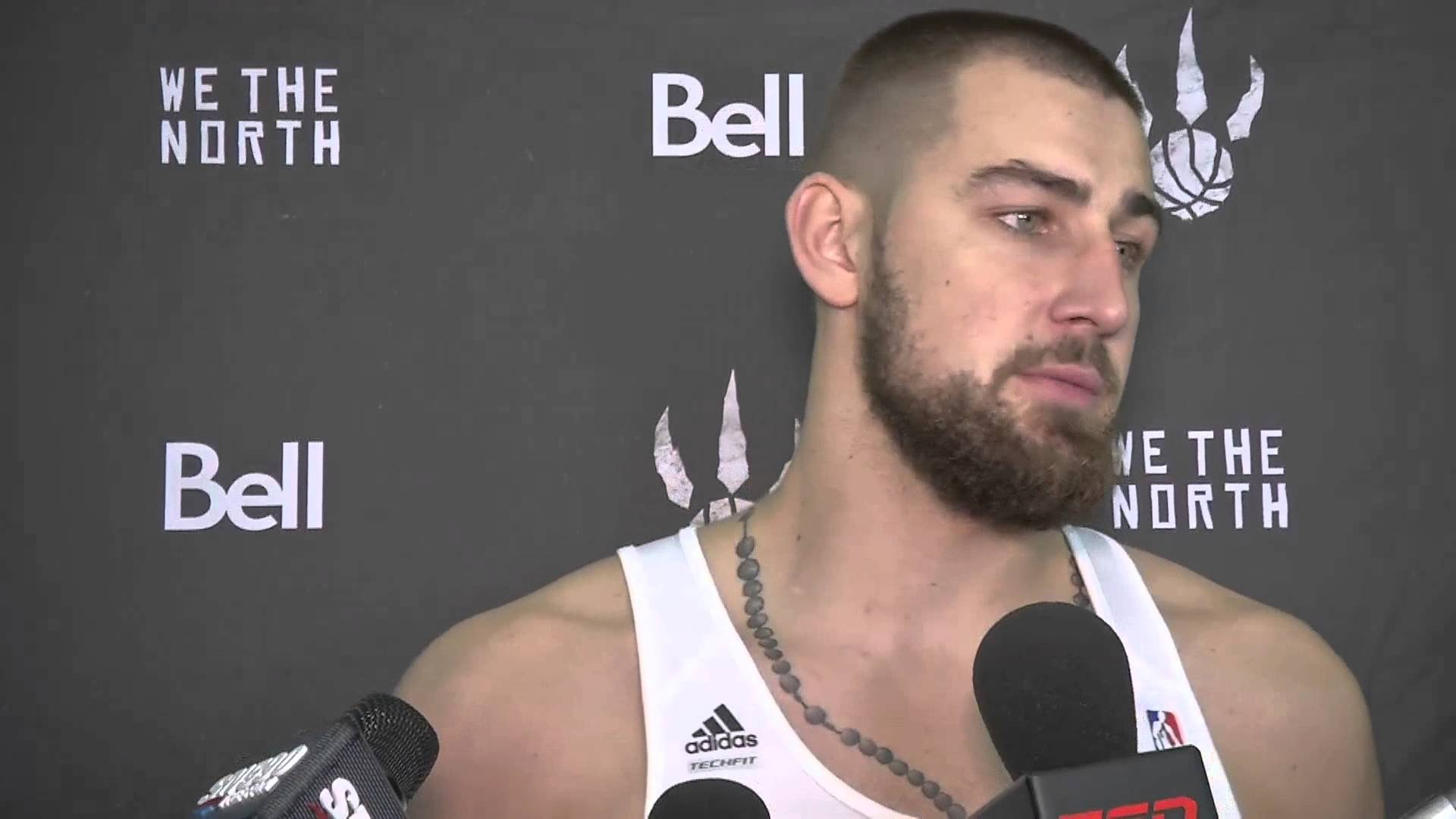 Raptors big man Jonas Valanciunas showing off his awful white guy "necklace" tattoo.