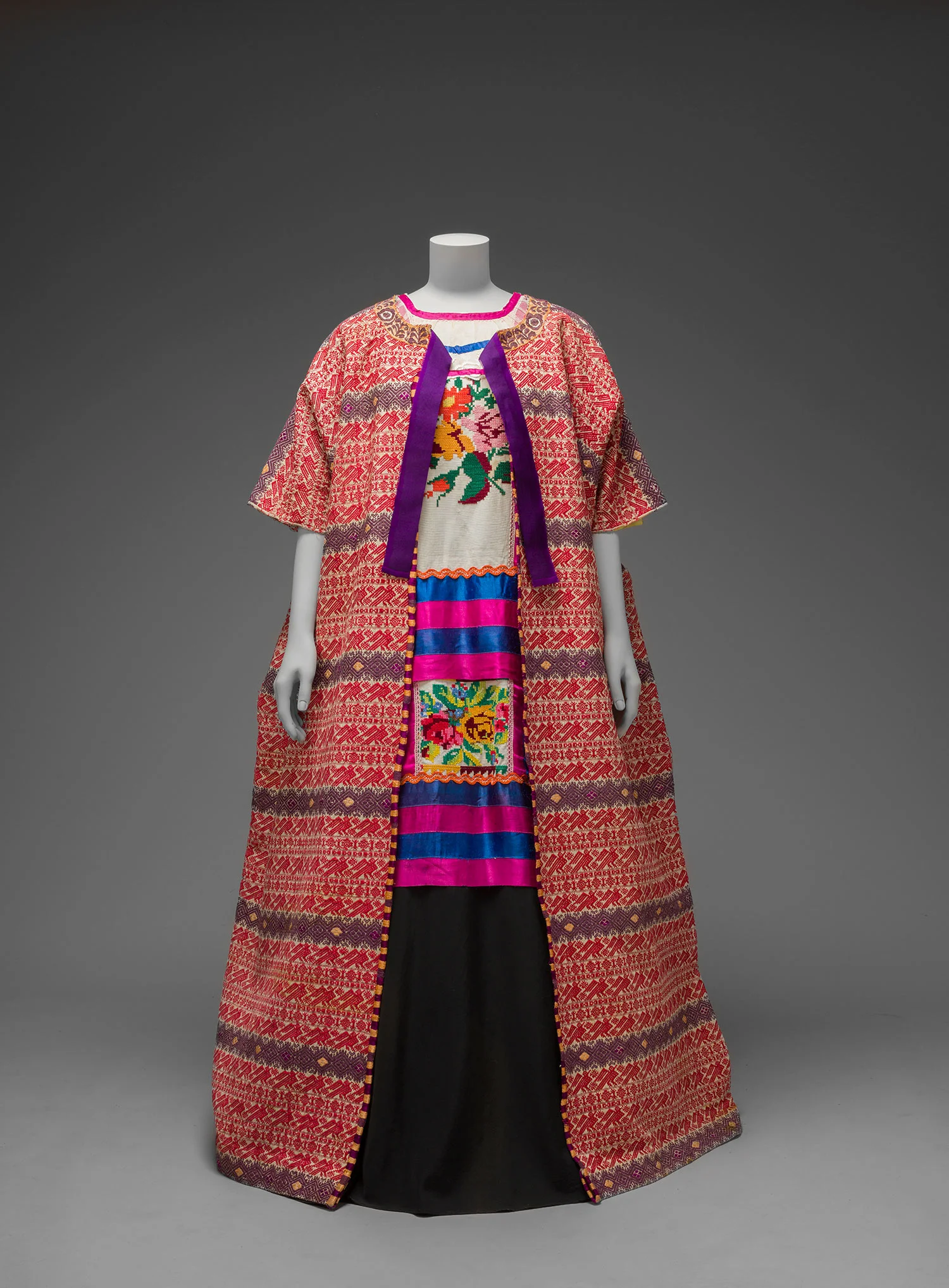 Guatemalan cotton coat worn with Mazatec huipil and plain floor- length skirt. Museo Frida Kahlo. Both images © Diego Rivera and Frida Kahlo Archives, Banco de México, Fiduciary of the Trust of the Diego Riviera and Frida Kahlo Museums.