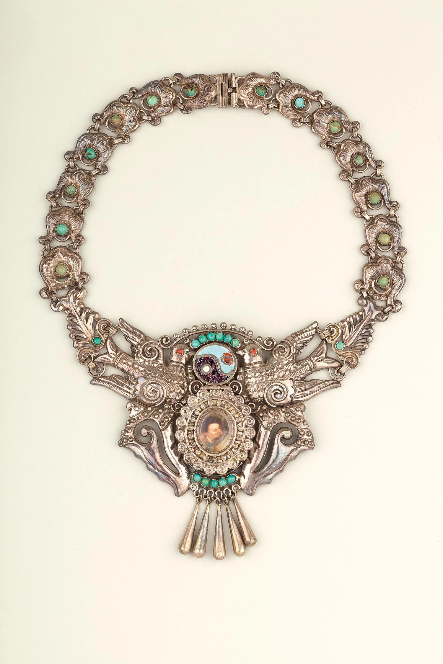 Necklace of silver, enamel, turquoise and coral with hinged compartment, made by Matilde Poulat, Mexico City, c.1950. Museo Frida Kahlo. Photograph Javier Hinojosa. © Diego Riviera and Frida Kahlo Archives, Banco de México, Fiduciary of the Trust o…