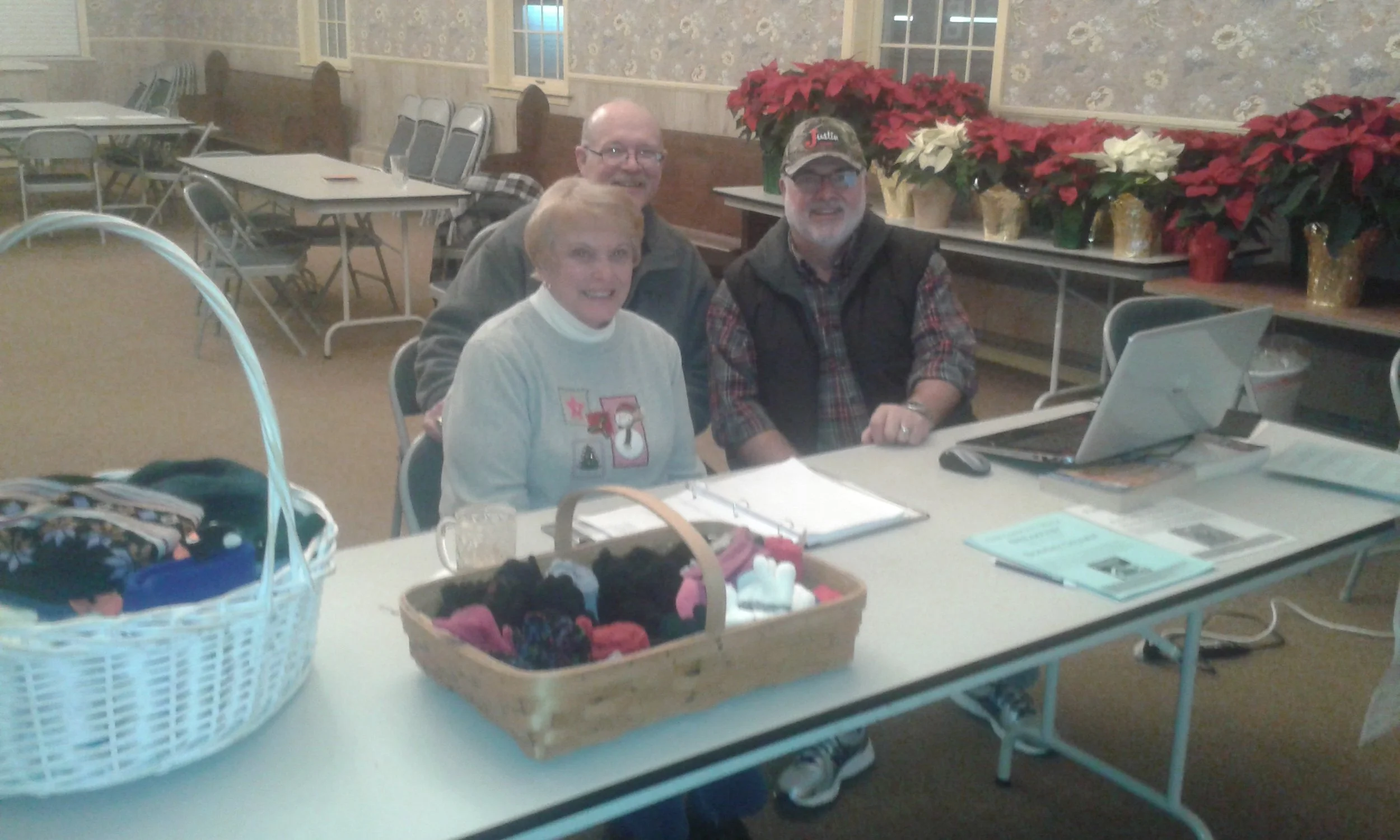 Karen Metsker, Rob Holl, and Fr. Thomas Haynes: NFP distribution day at St Thomas' Plymouth