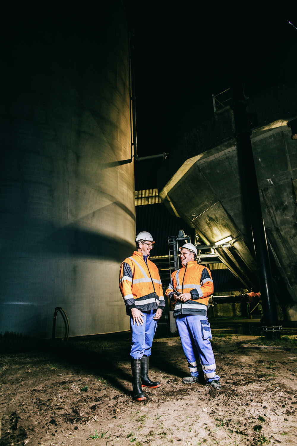 industrial night portrait two workers