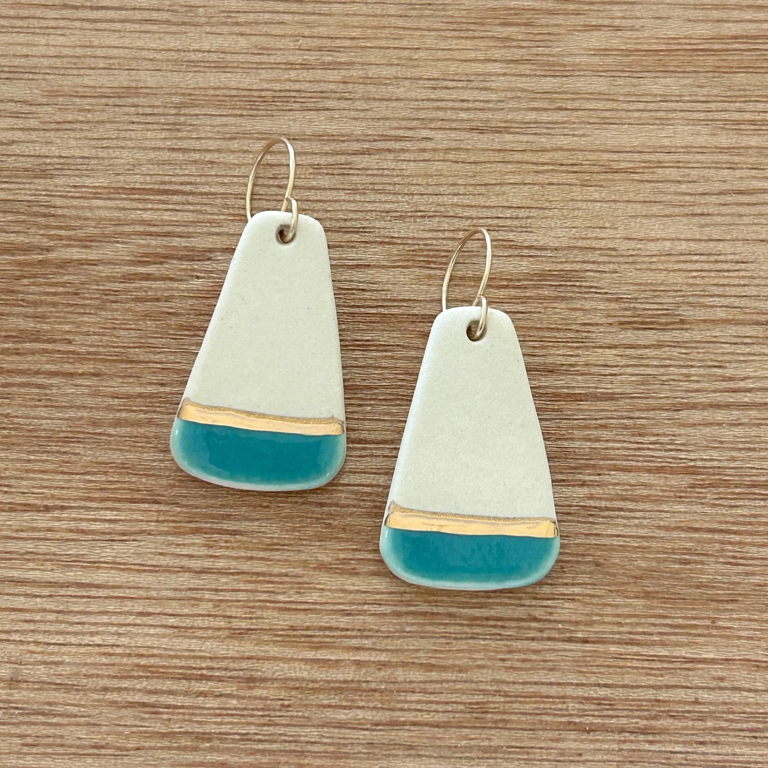 ZOË COMINGS large fan earrings, teal:gl wdbkg.jpg