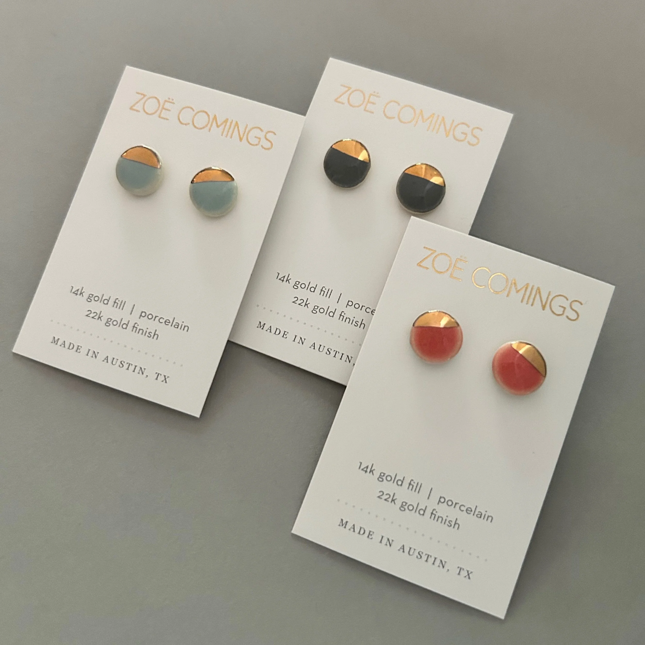 ZOË COMINGS pebble studs, bl, dk, cl, grbkg.jpg