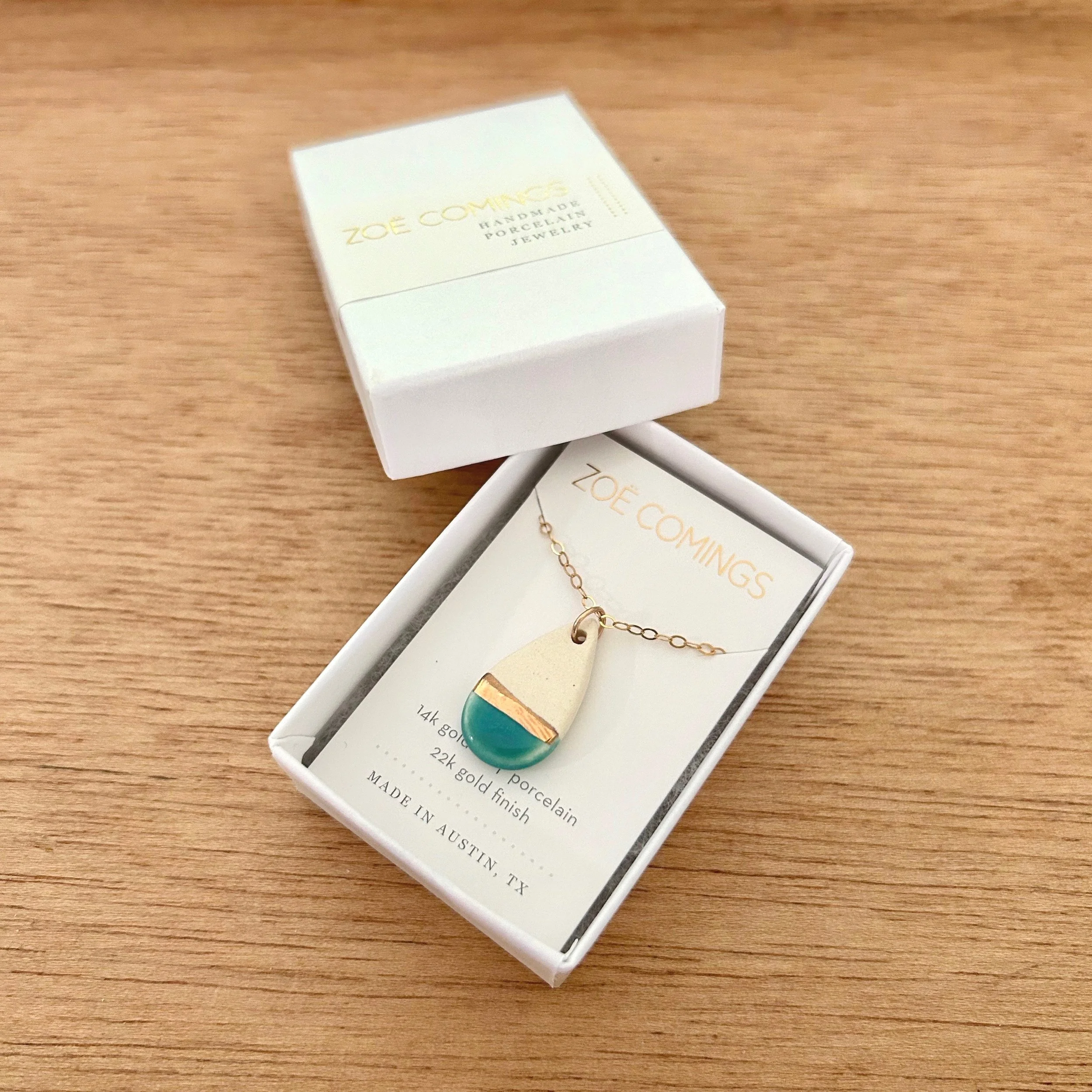 ZOE%CC%88+COMINGS+teardrop+necklace%2C+teal+boxed+a+lid.jpg