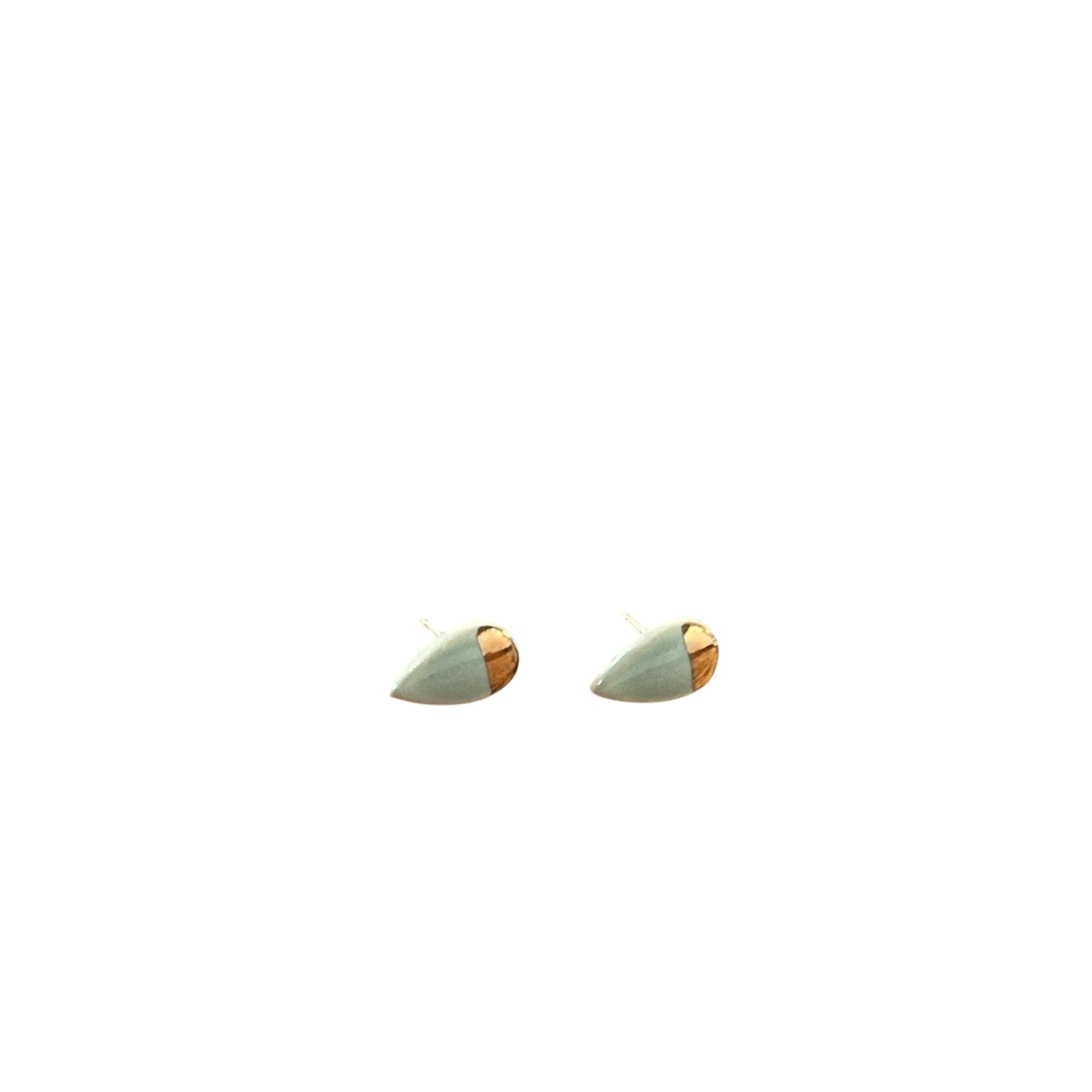 ZOË COMINGS tiny petal studs, pale blue:gold half, wbg.jpeg