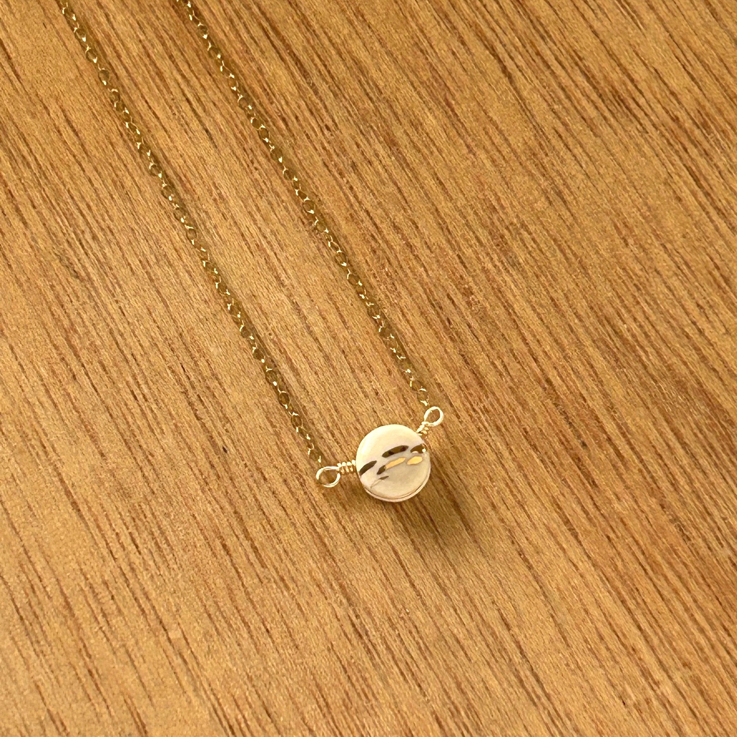 ZOE%CC%88+COMINGS+teeny+pebble+necklace%2C+shimmer+-+pale+pink+wdbkg+a.jpg