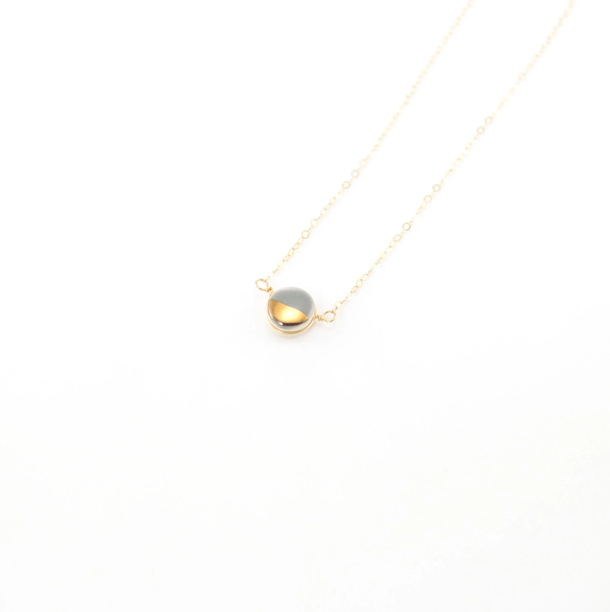 ZOË COMINGS teeny pebble necklace, dark grey:gold.jpg