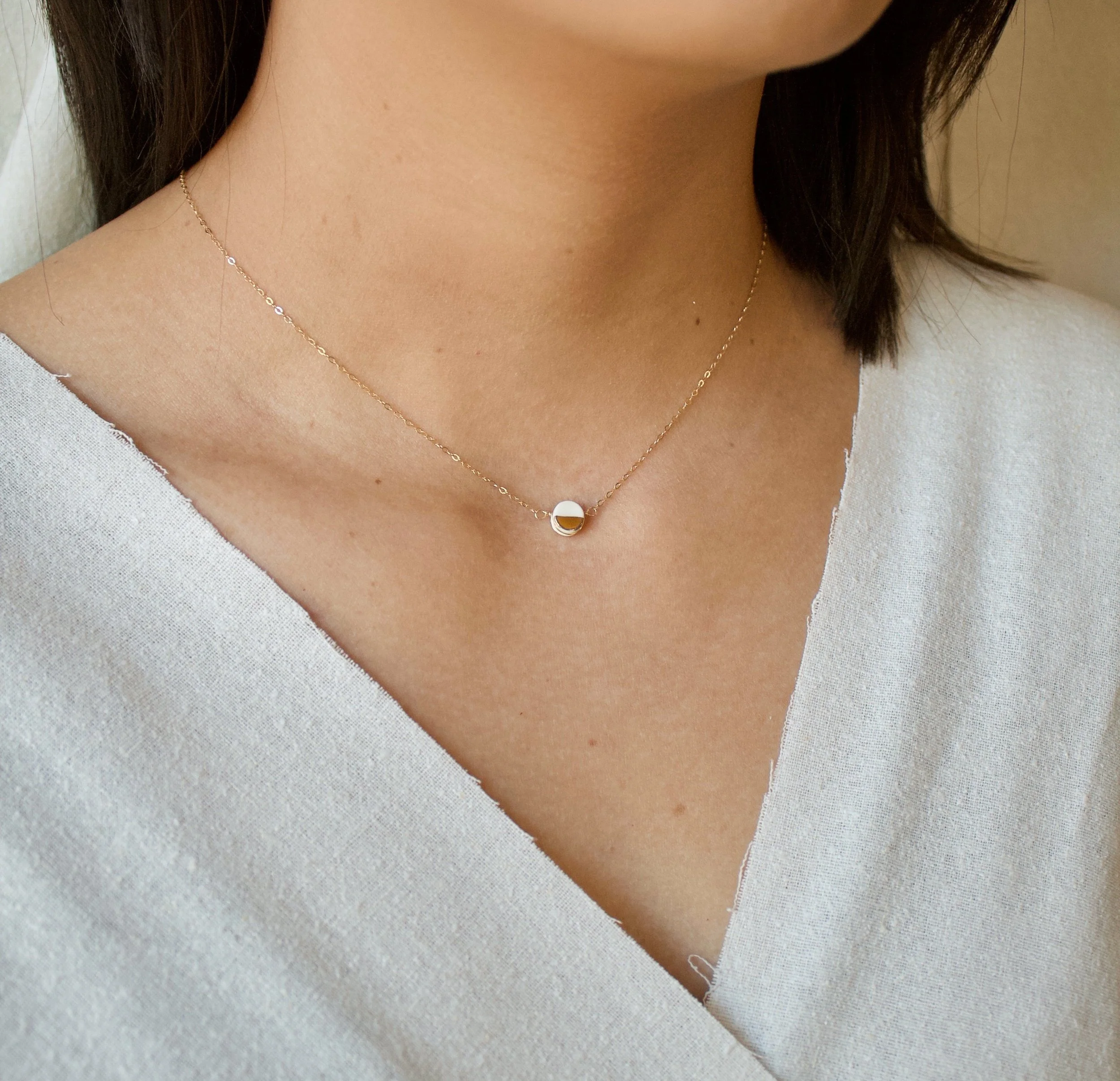 ZOË COMINGS model teeny pebble necklace white:gold sl.jpg