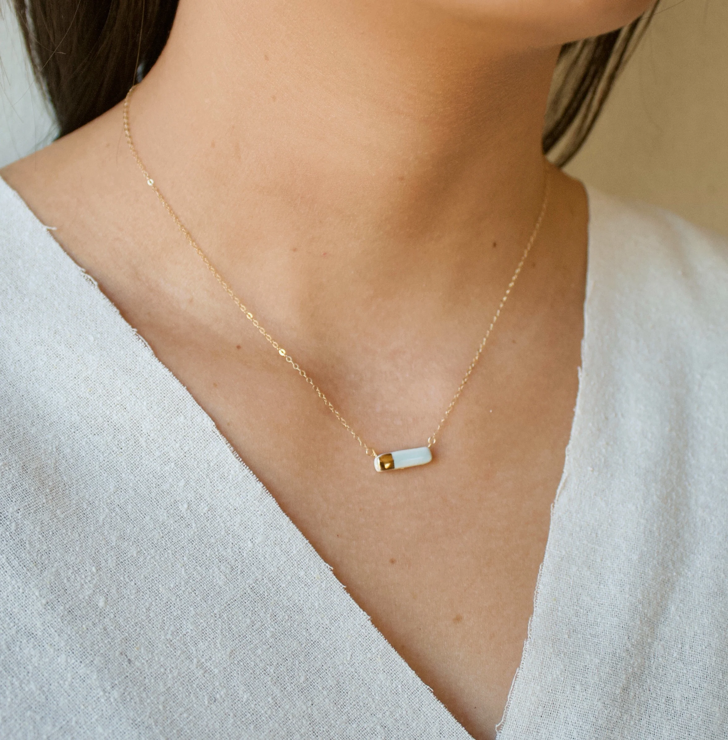 ZOË COMINGS model teeny reed necklace blue:gold sl.jpg