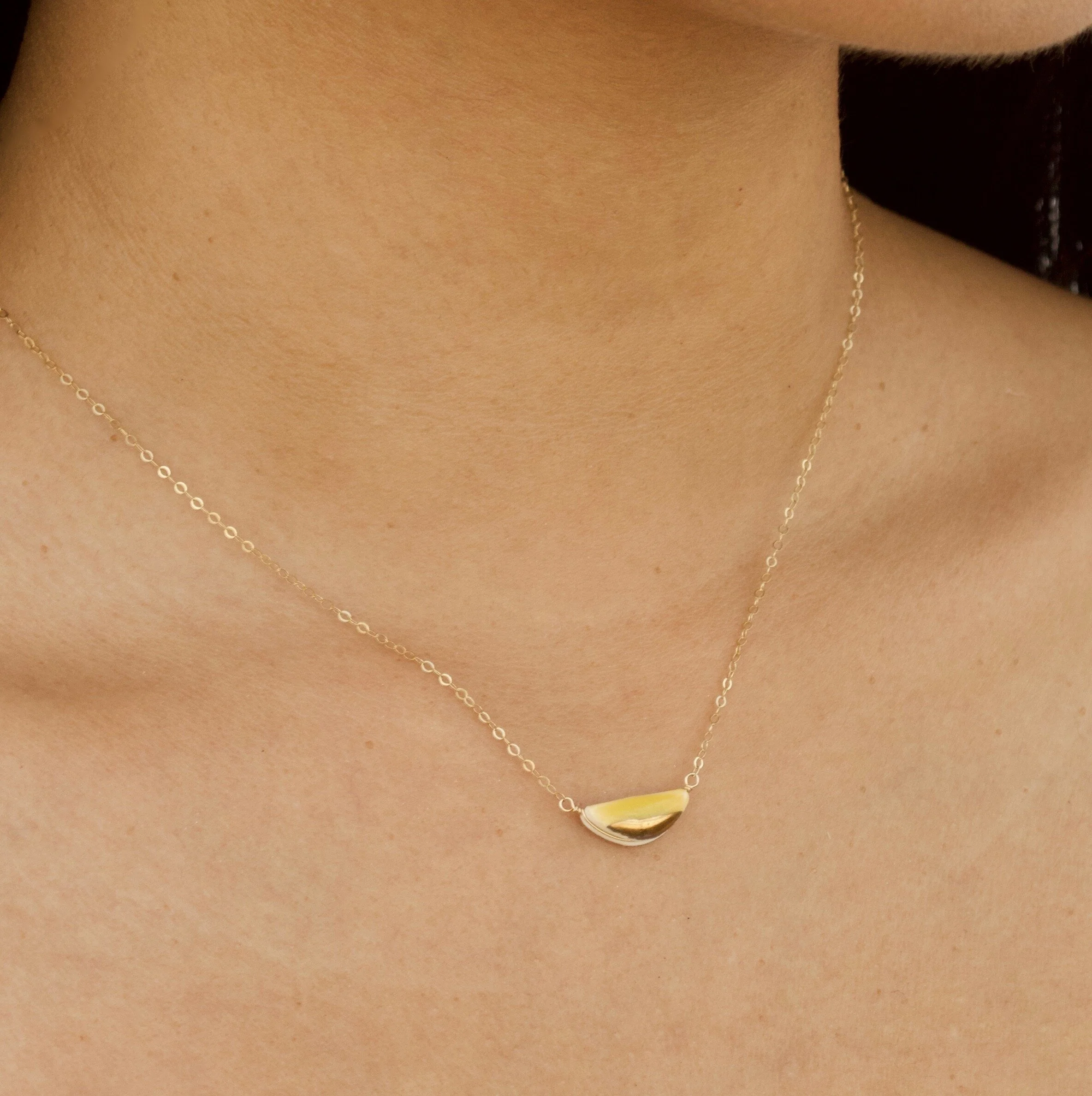 ZOË COMINGS  teeny half pebbe necklace marigold:gold model.jpg