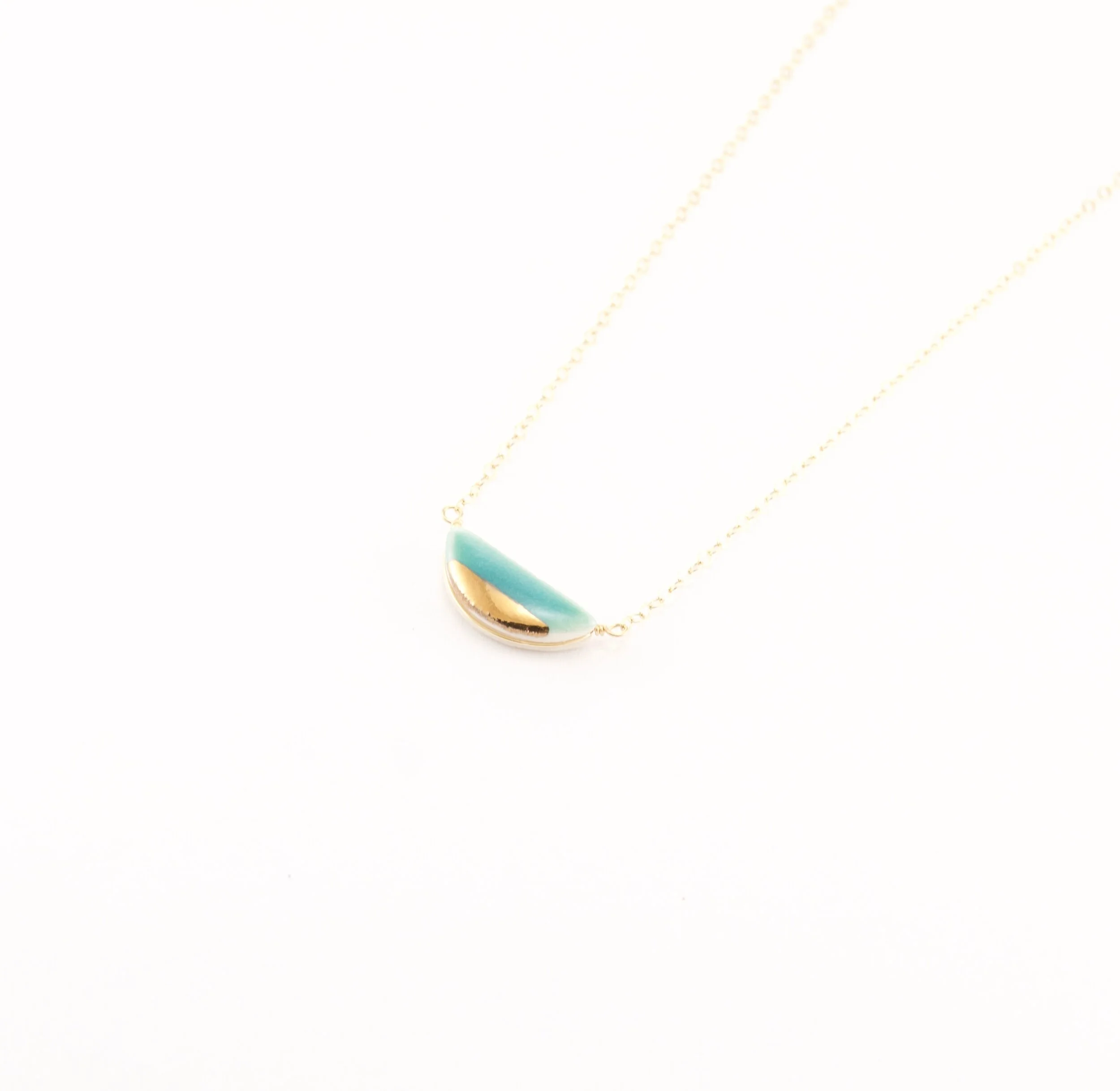 ZOË COMINGS teeny half pebble necklace teal:gold.jpg