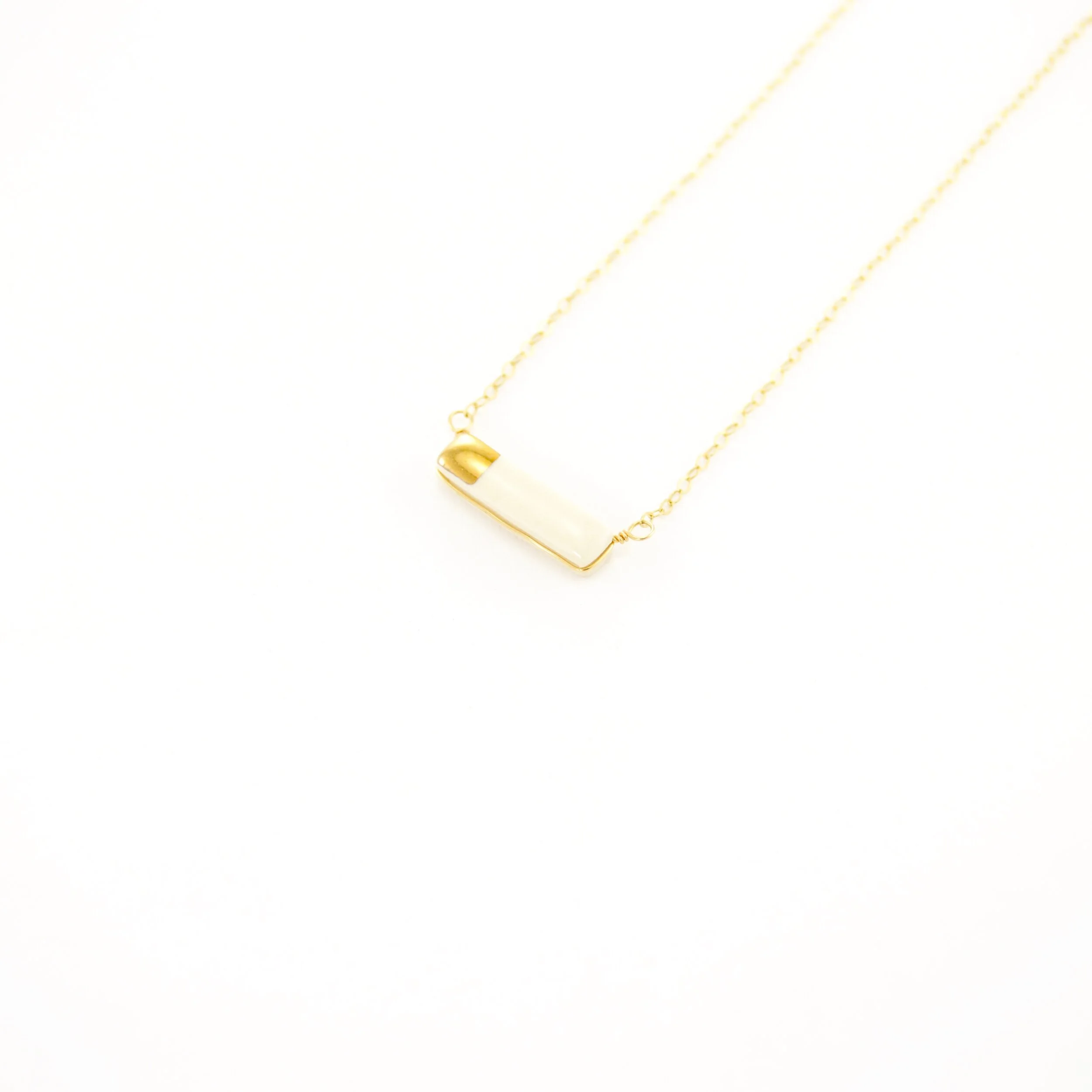 ZOË COMINGS teeny reed necklace white:gold, angle.jpg