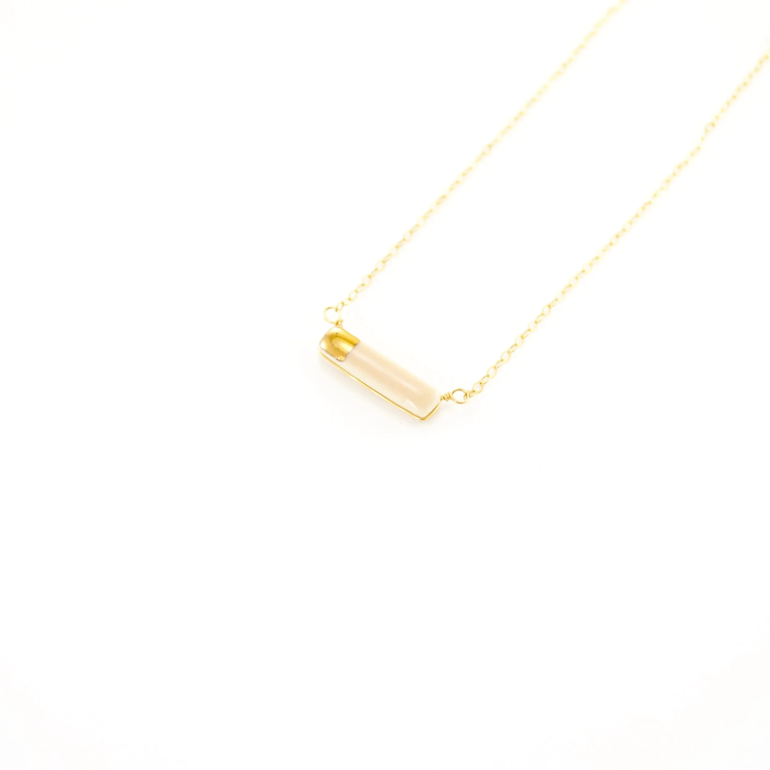 ZOË COMINGS teeny reed necklace pale pink:gold, angle.jpg