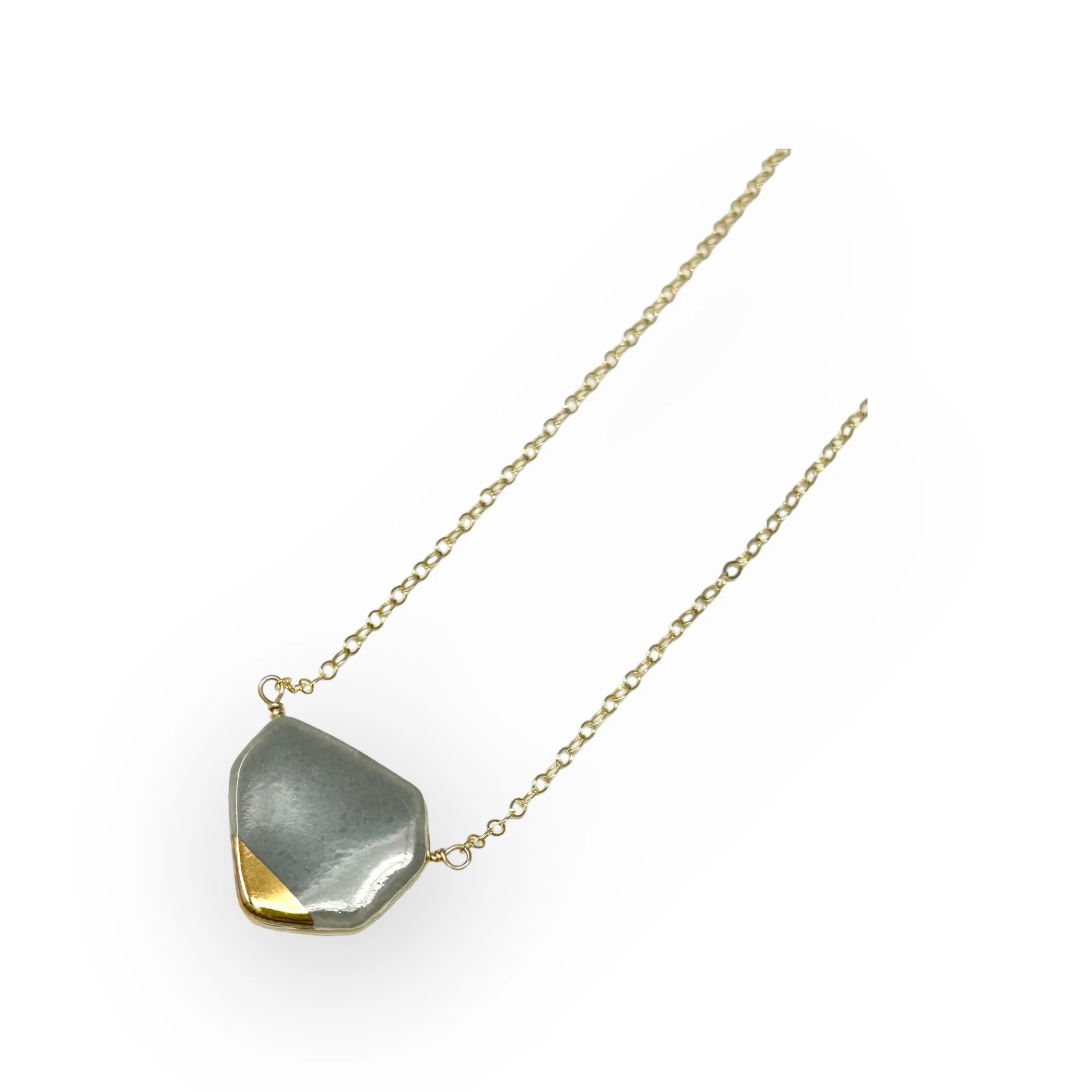 ZOË COMINGS geo necklace horizon dark grey:gold angle p.jpg