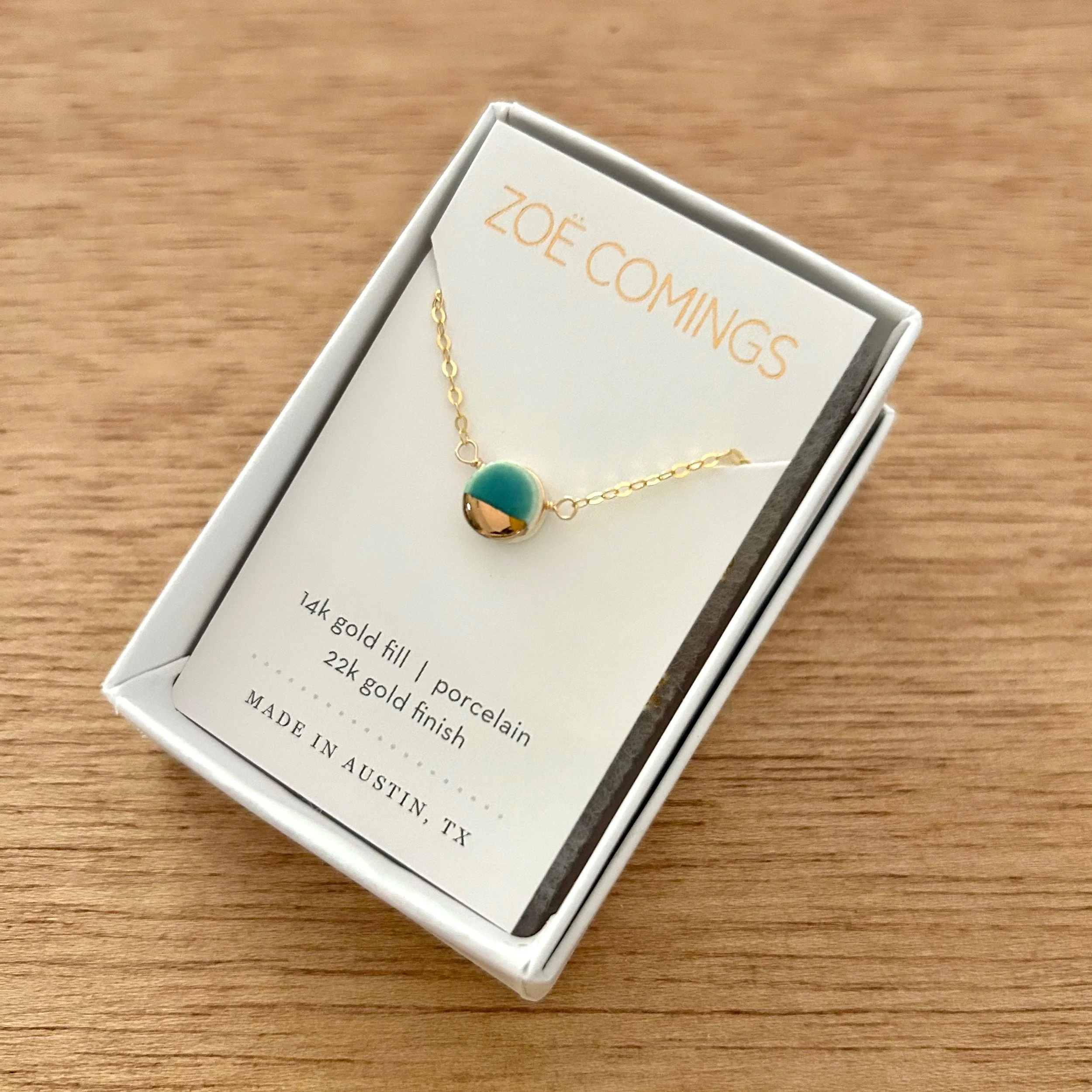 ZOË COMINGS teeny pebble necklace, teal boxed a.jpg