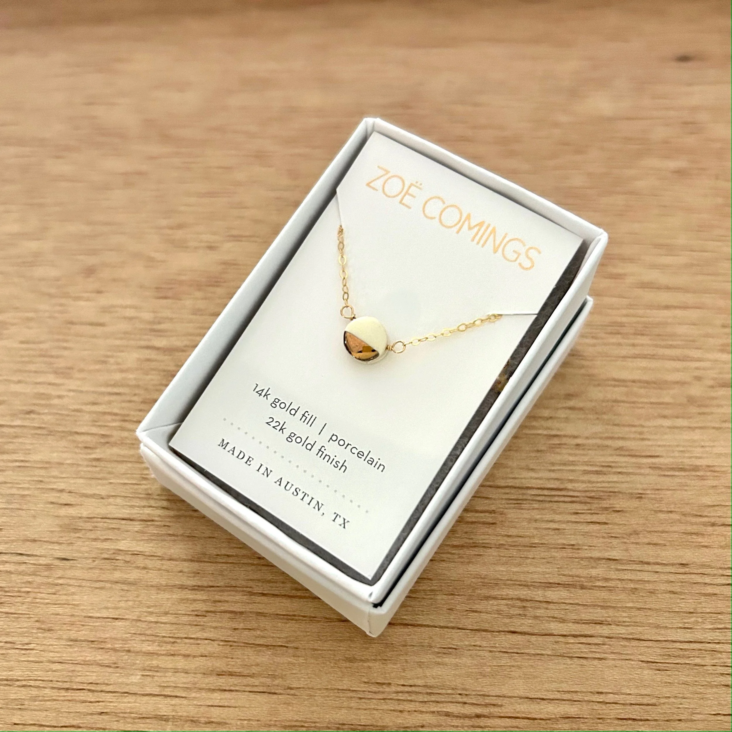 ZOË COMINGS teeny pebble necklace, white boxed a.jpg