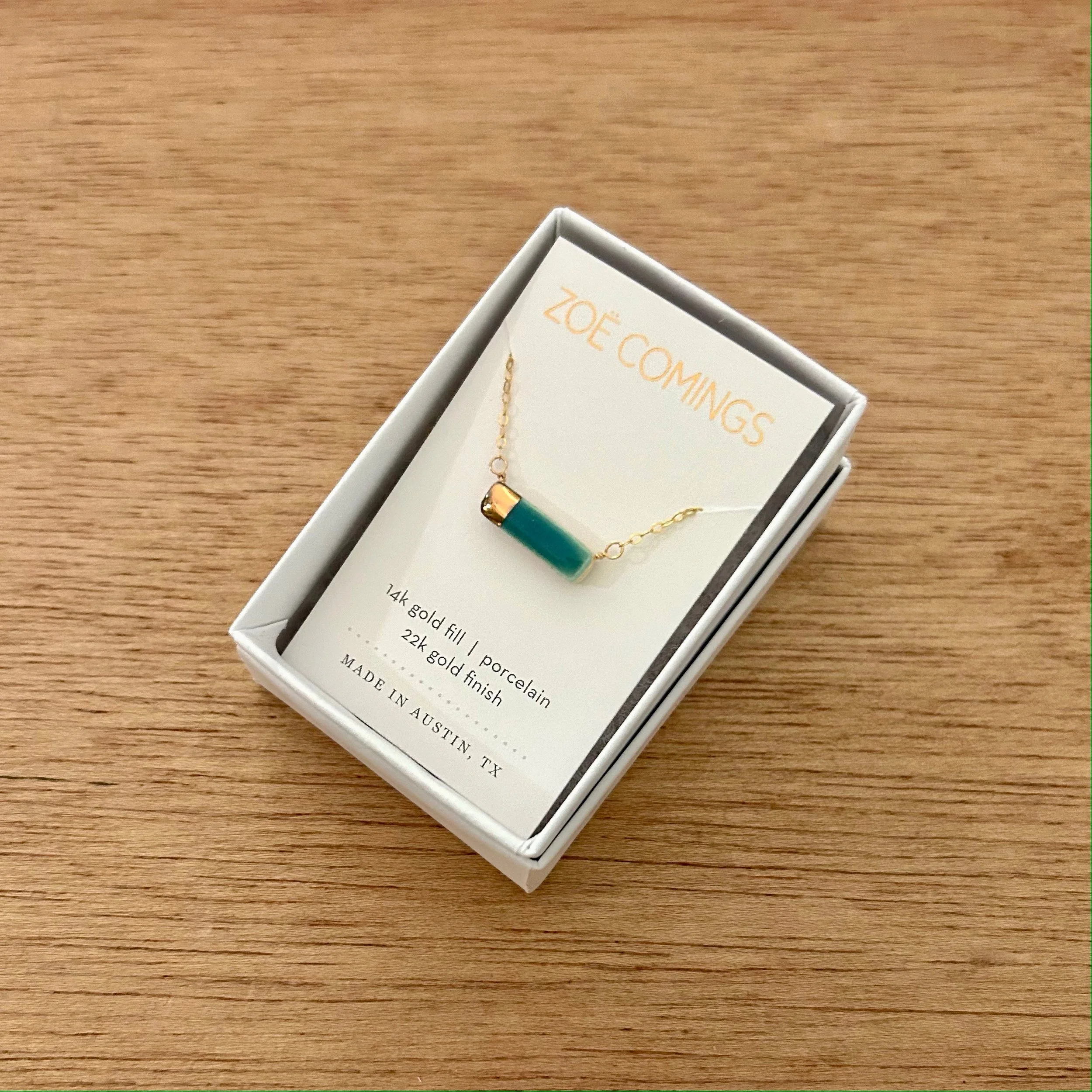 ZOË COMINGS teeny reed necklace, teal boxed a.jpg